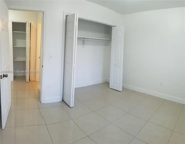 an empty room with closet