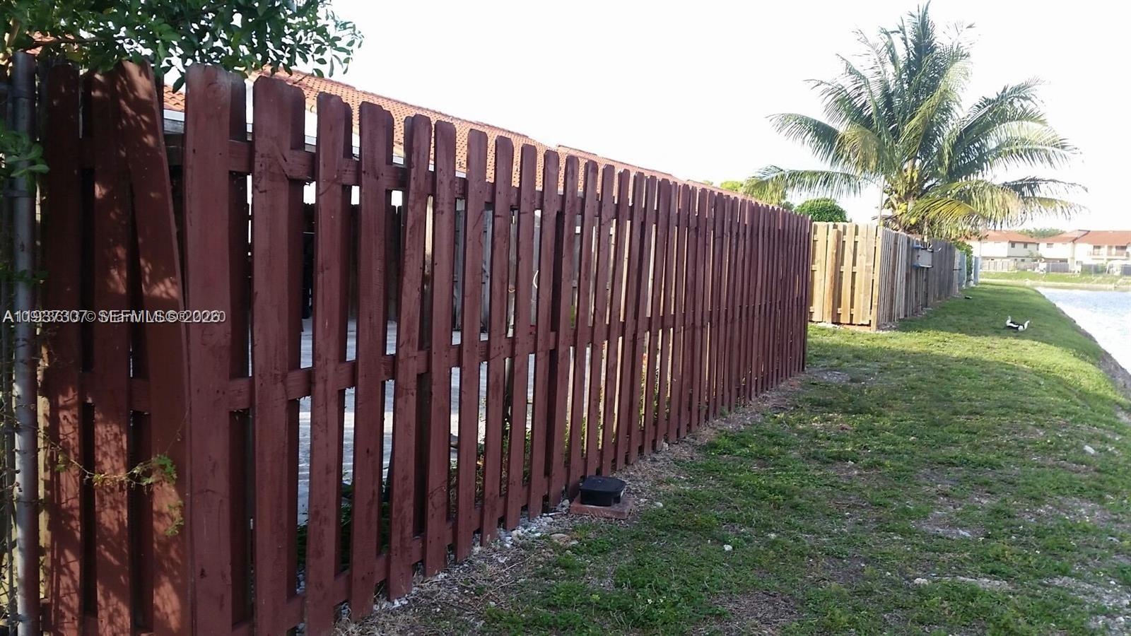 13516 Southwest 59th Lane Miami, FL 33183 - Photo 17 of 20 a view of a wooden fence