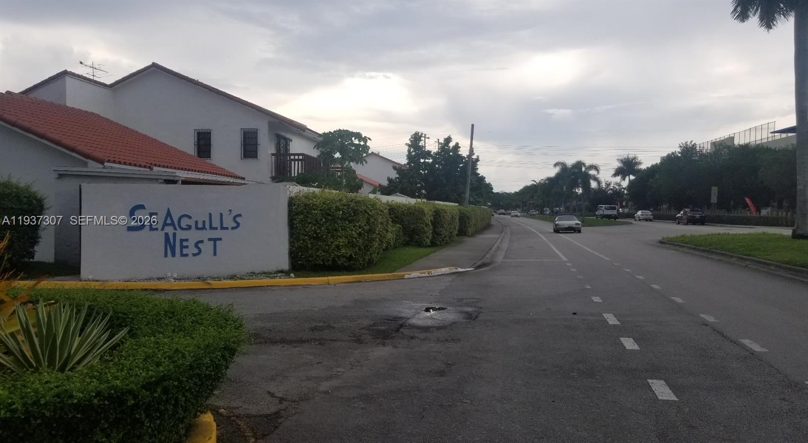 13516 Southwest 59th Lane Miami, FL 33183 - Photo 5 of 20 a view of a street with houses