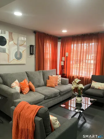 a bedroom with two beds and painted walls