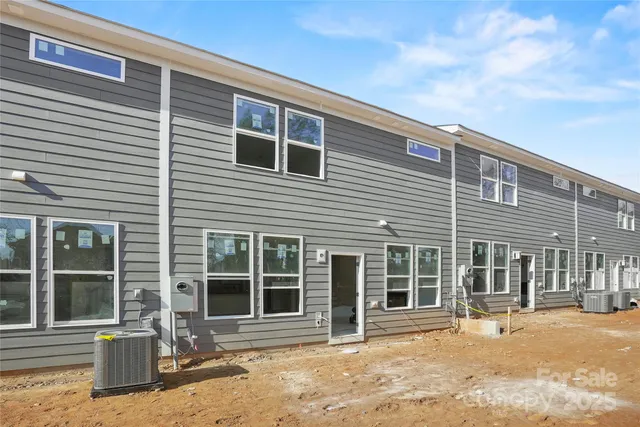 a front view of a house with a patio