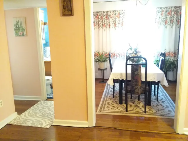 a view of living room filled with furniture