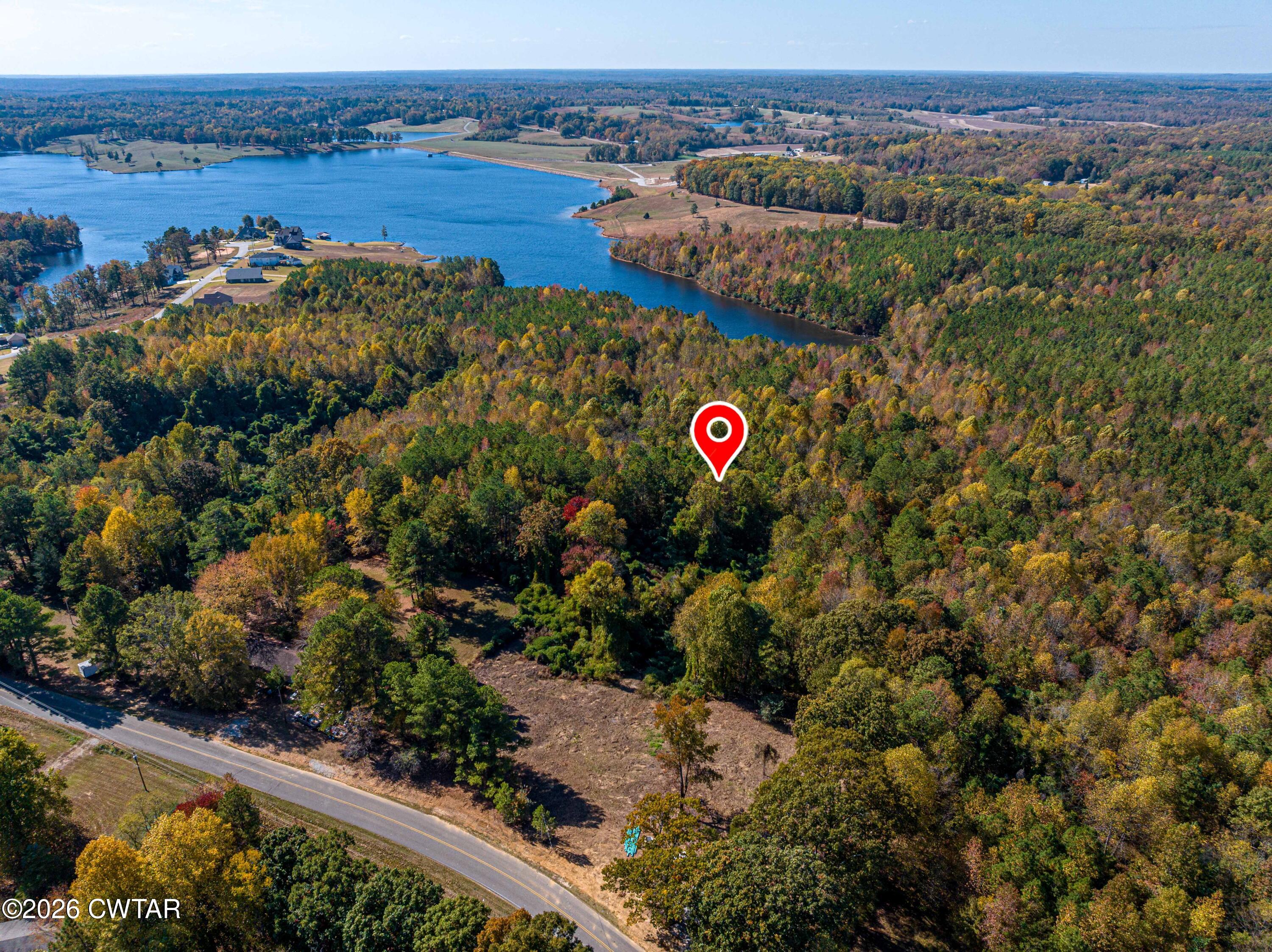 568 Baker Road Huntingdon, TN 38344 - Photo 2 of 21 a view of a bunch of trees and bushes