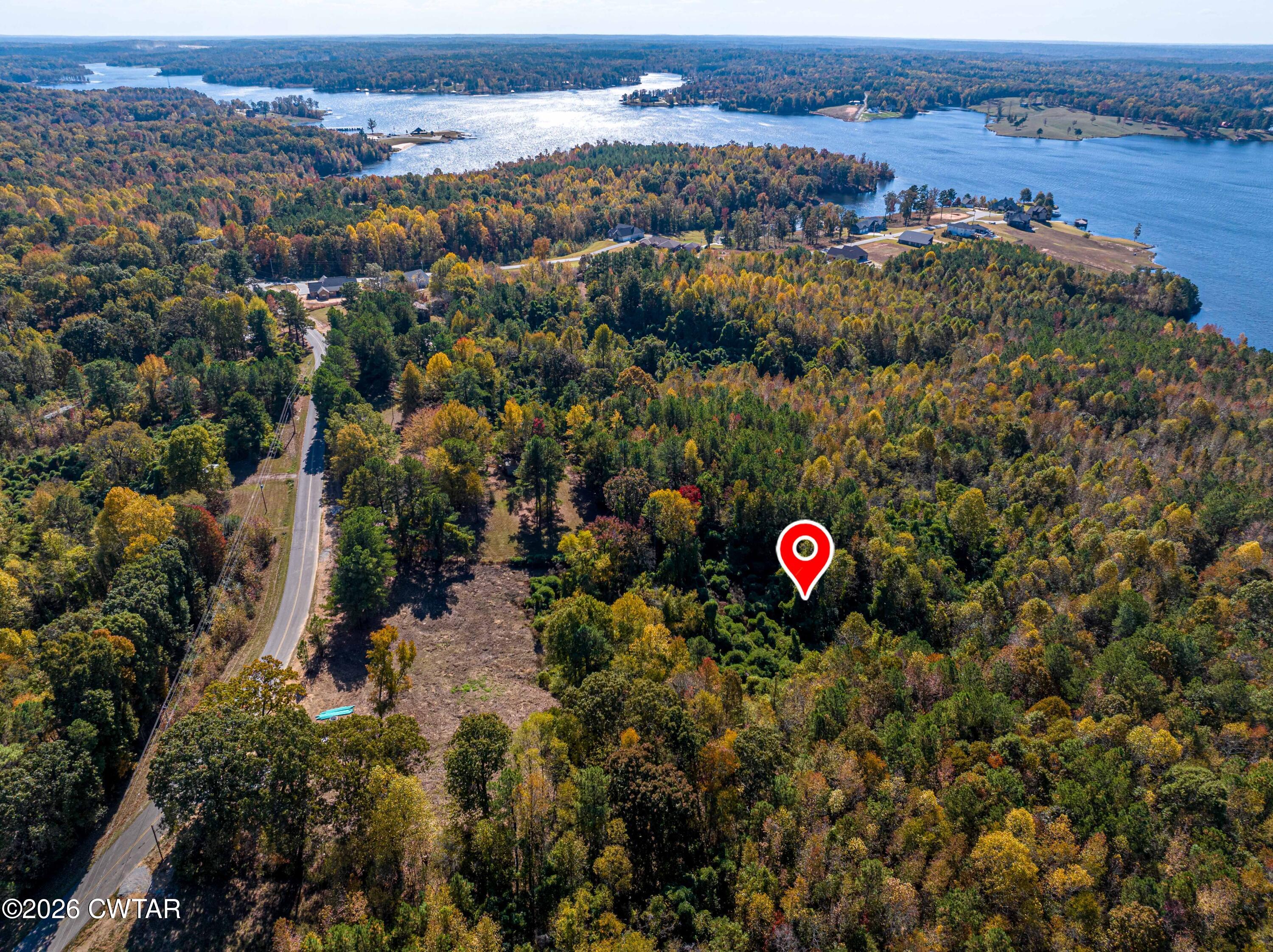 568 Baker Road Huntingdon, TN 38344 - Photo 4 of 21 an aerial view of residential houses with outdoor space and trees