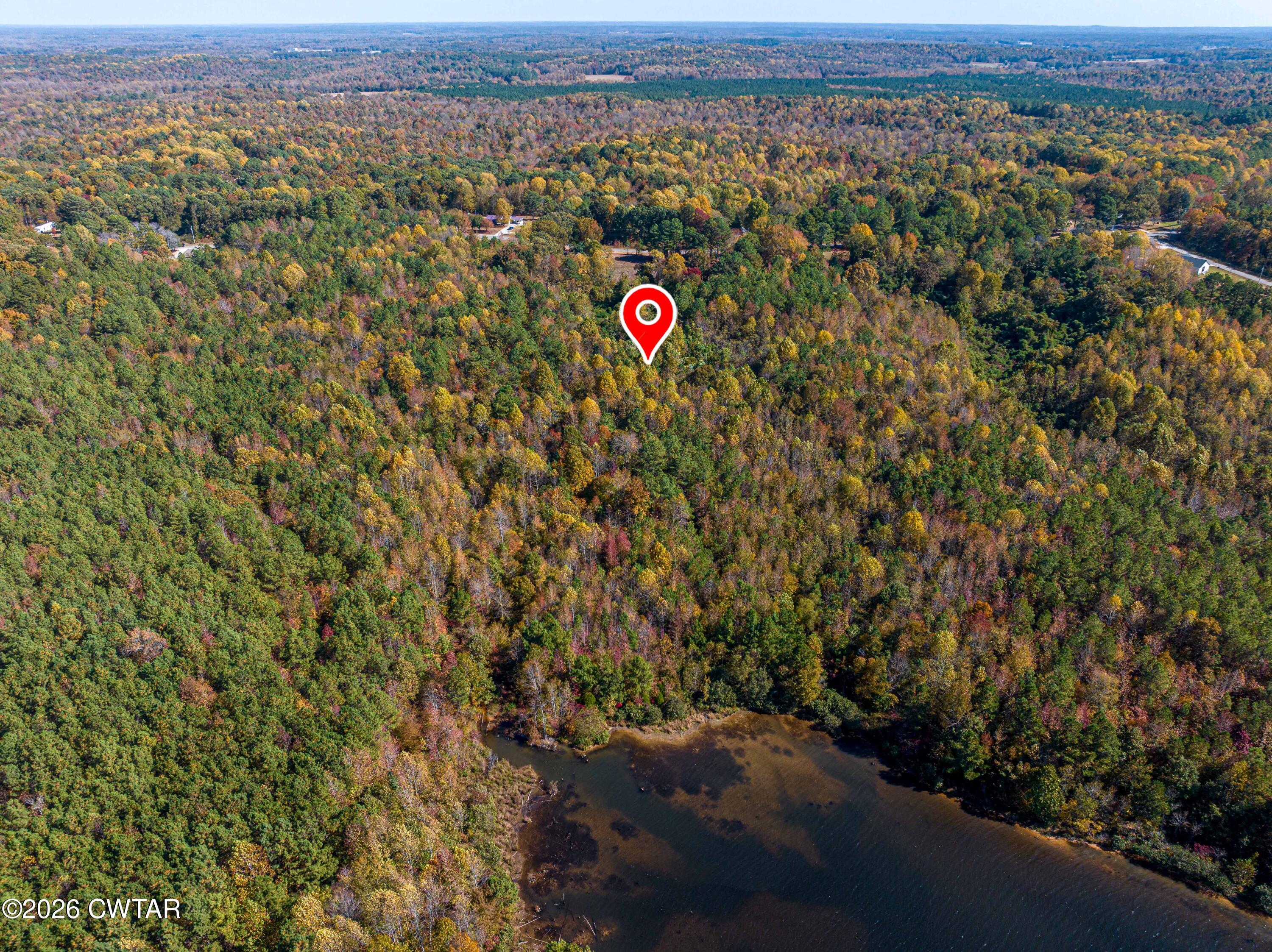 568 Baker Road Huntingdon, TN 38344 - Photo 5 of 21 an aerial view of residential house and car parked