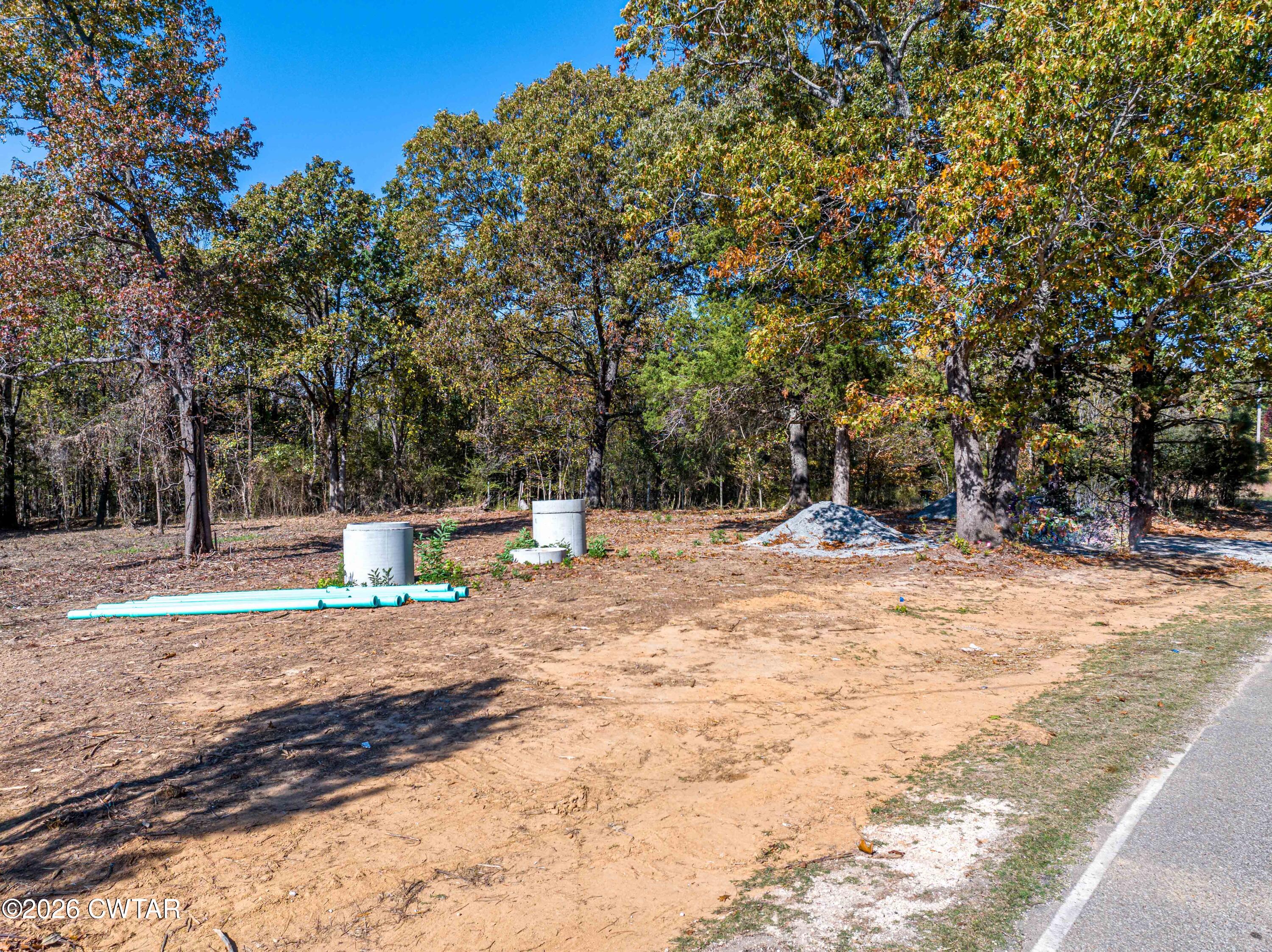 568 Baker Road Huntingdon, TN 38344 - Photo 9 of 21 a house with trees in the background