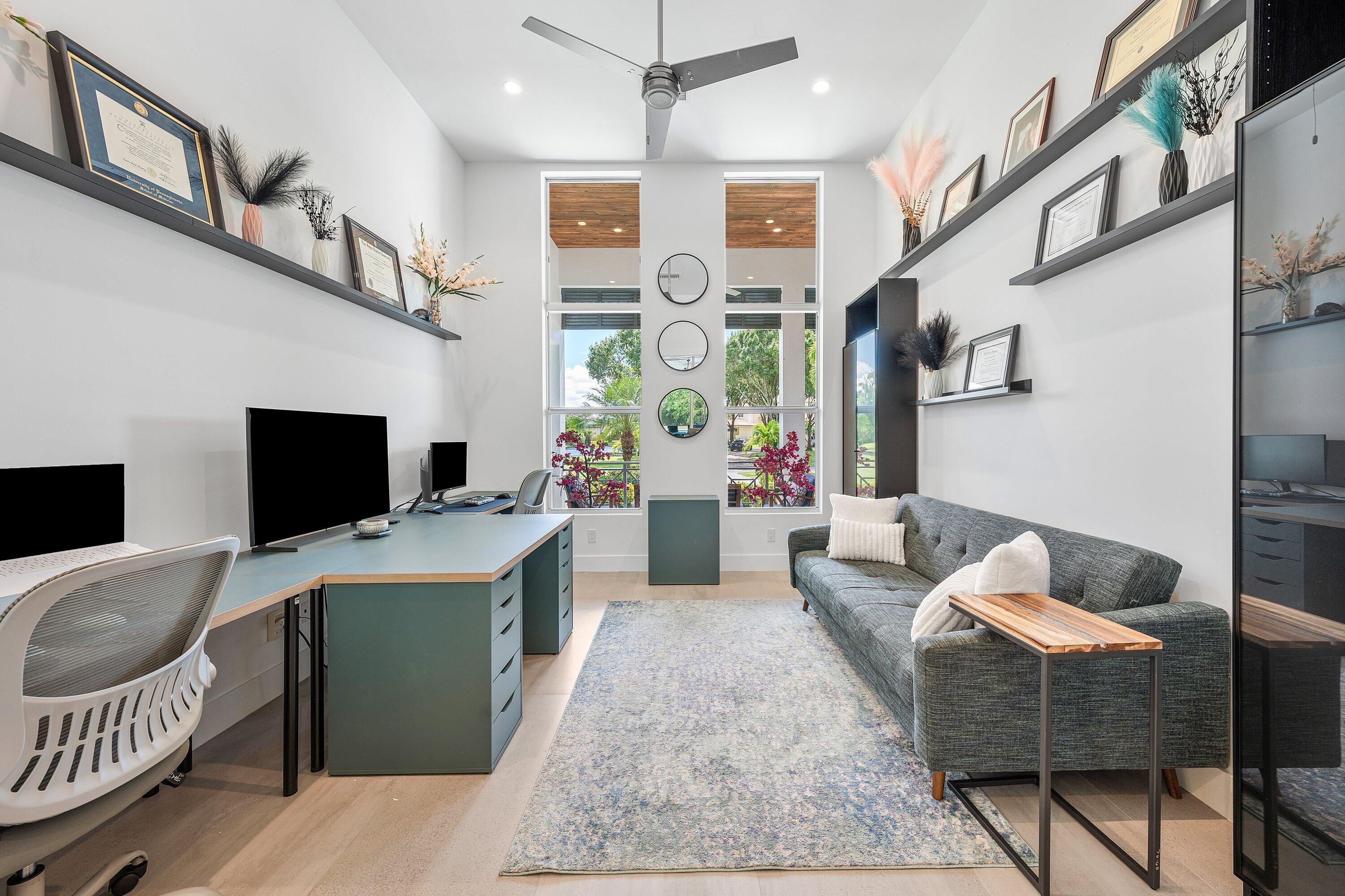 17664 Fieldbrook Circle East Boca Raton, FL 33496 - Photo 27 of 90 a living room with furniture and a flat screen tv