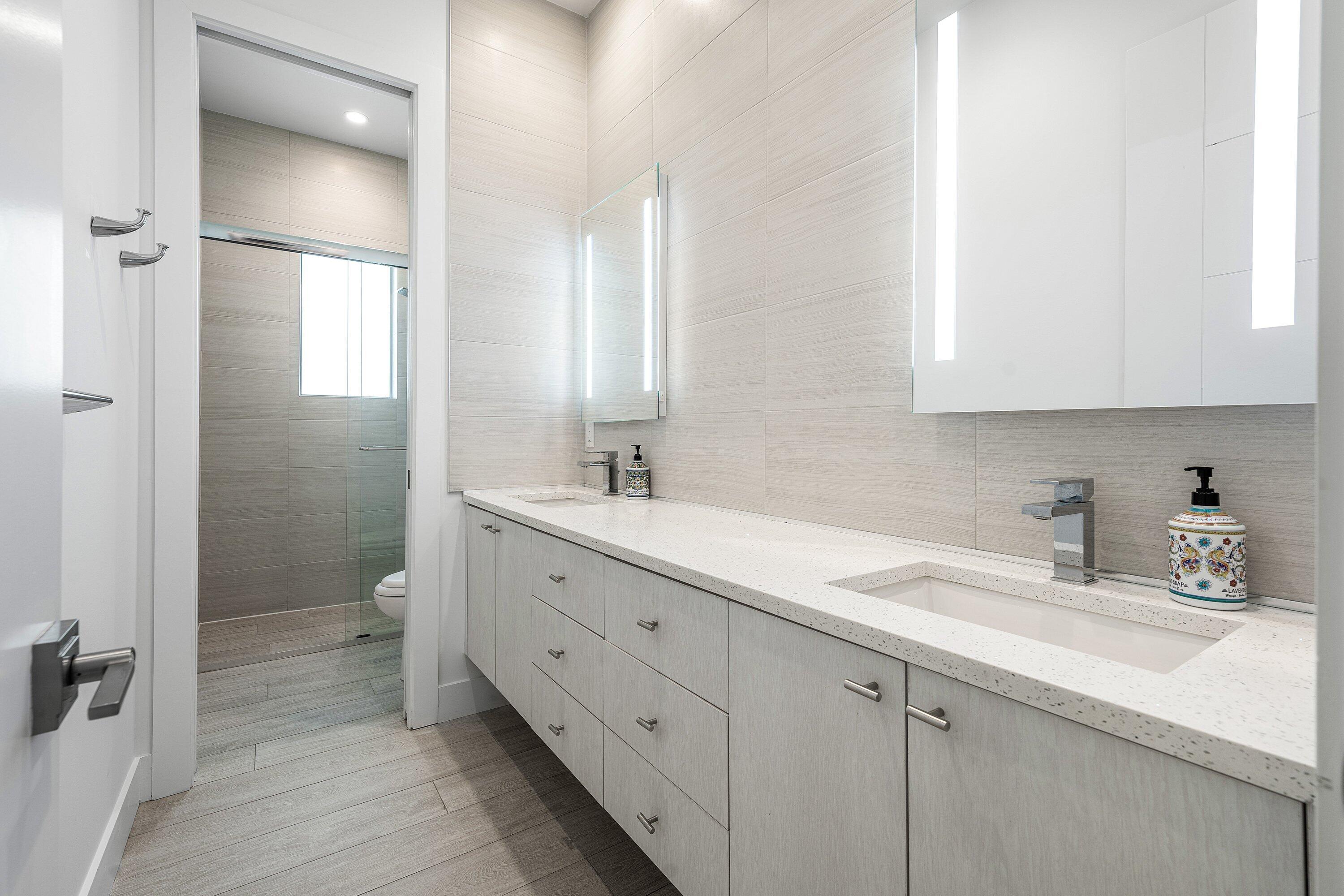 17664 Fieldbrook Circle East Boca Raton, FL 33496 - Photo 55 of 90 a bathroom with a double vanity sink mirror and double