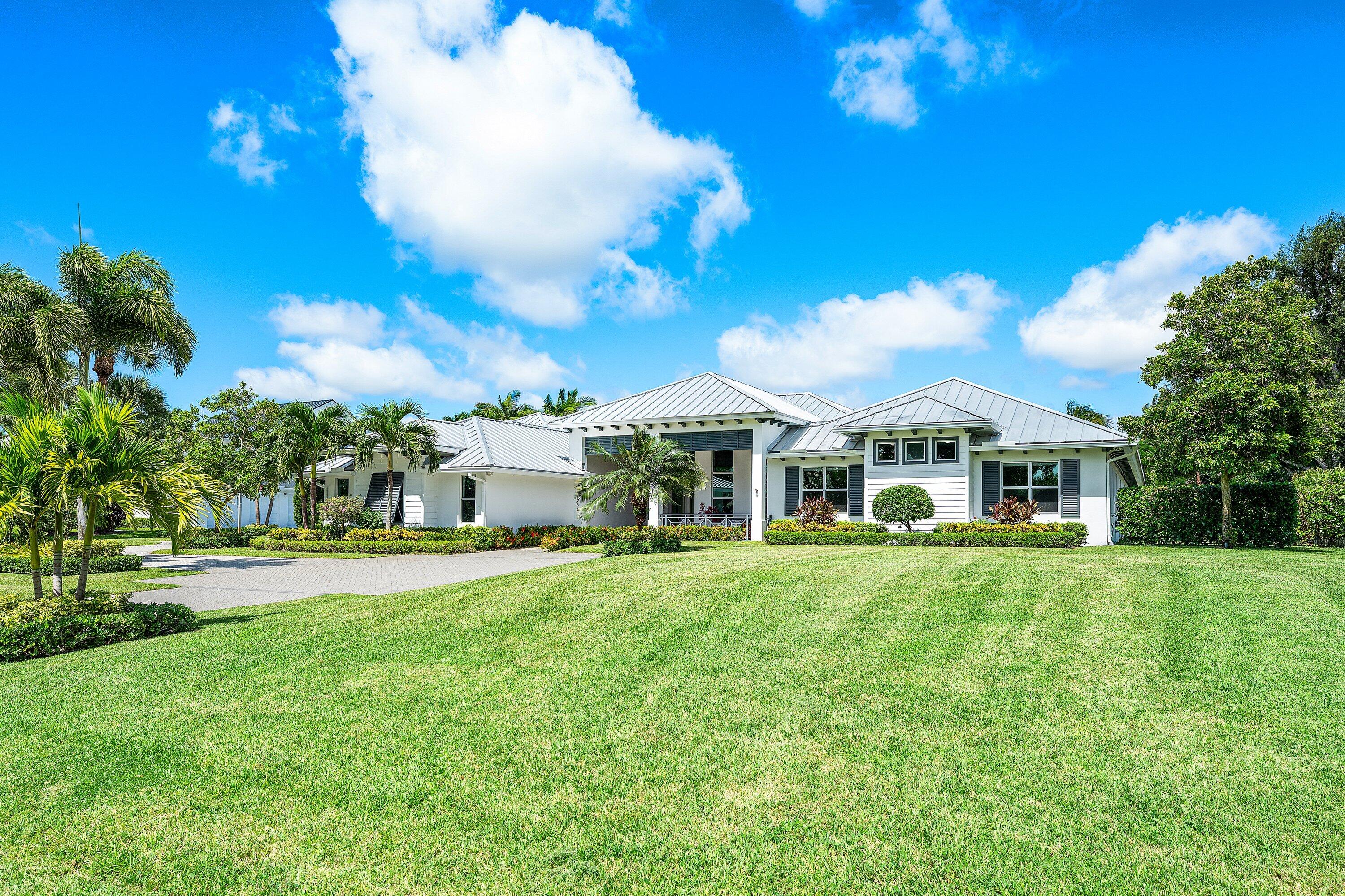 17664 Fieldbrook Circle East Boca Raton, FL 33496 - Photo 6 of 90 a front view of a house with yard and green space