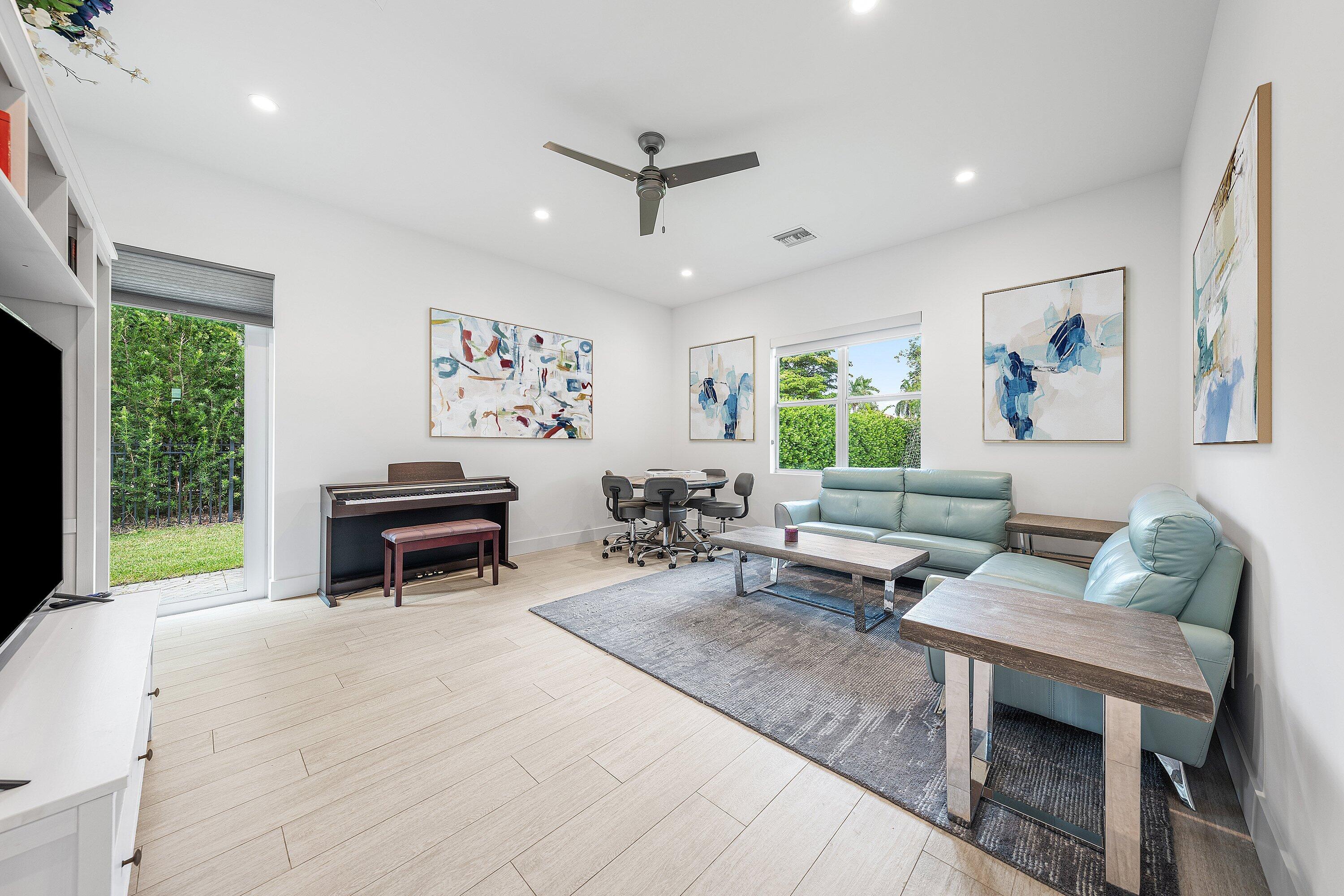 17664 Fieldbrook Circle East Boca Raton, FL 33496 - Photo 62 of 90 a living room with furniture and a large window
