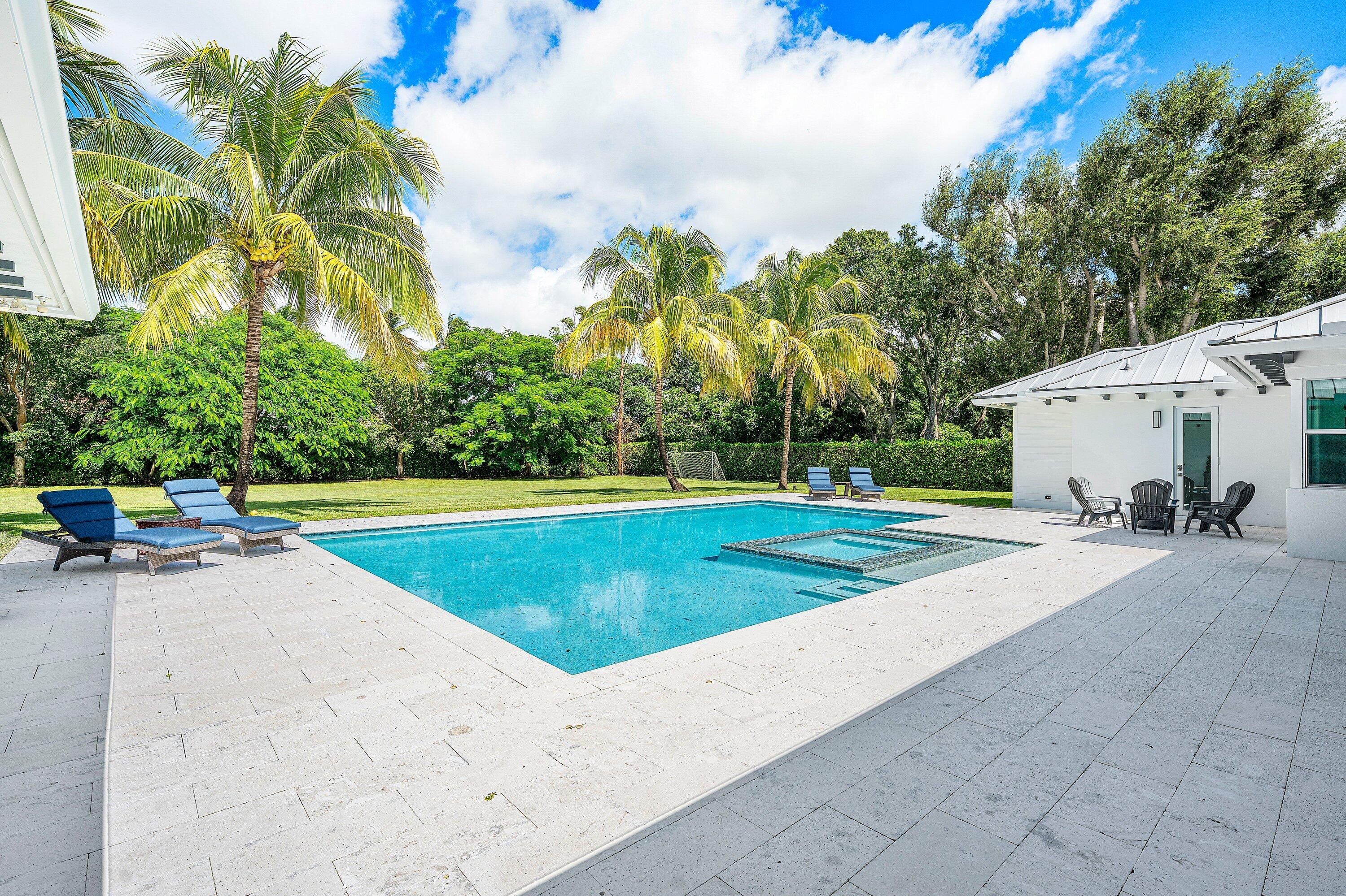 17664 Fieldbrook Circle East Boca Raton, FL 33496 - Photo 76 of 90 a view of a swimming pool with a yard