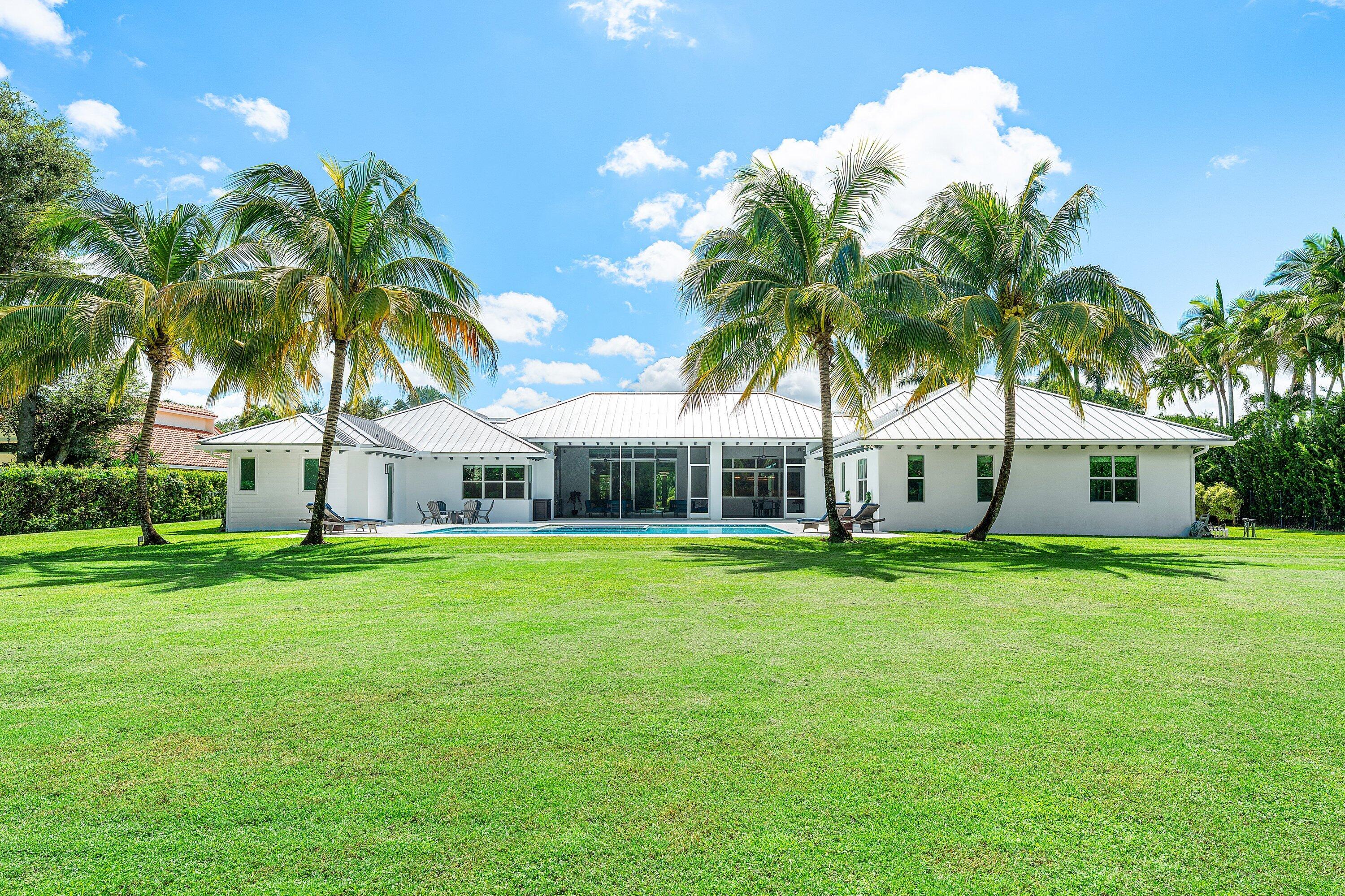 17664 Fieldbrook Circle East Boca Raton, FL 33496 - Photo 79 of 90 a front view of a house with a garden