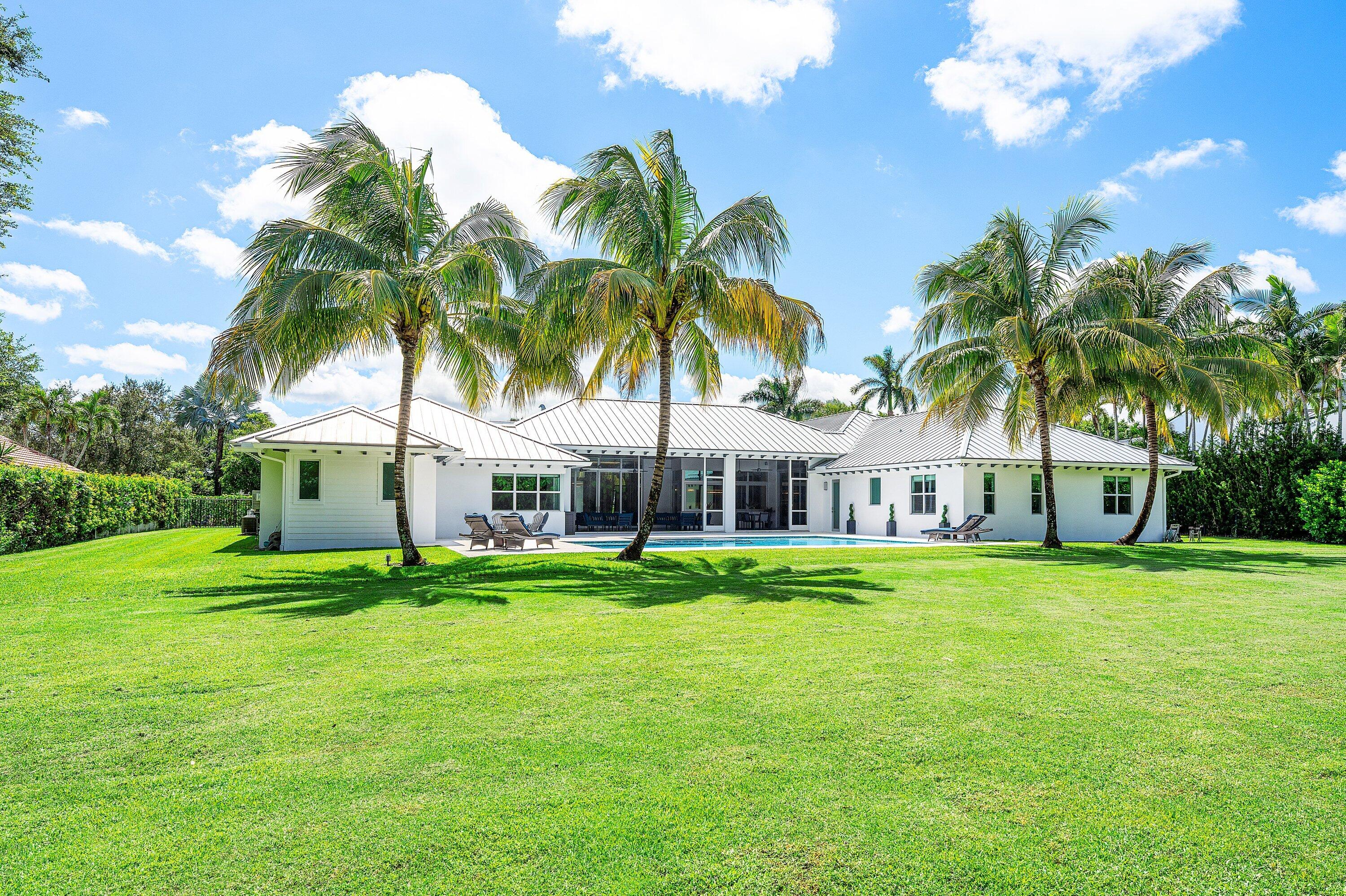 17664 Fieldbrook Circle East Boca Raton, FL 33496 - Photo 80 of 90 a front view of house and yard with green space