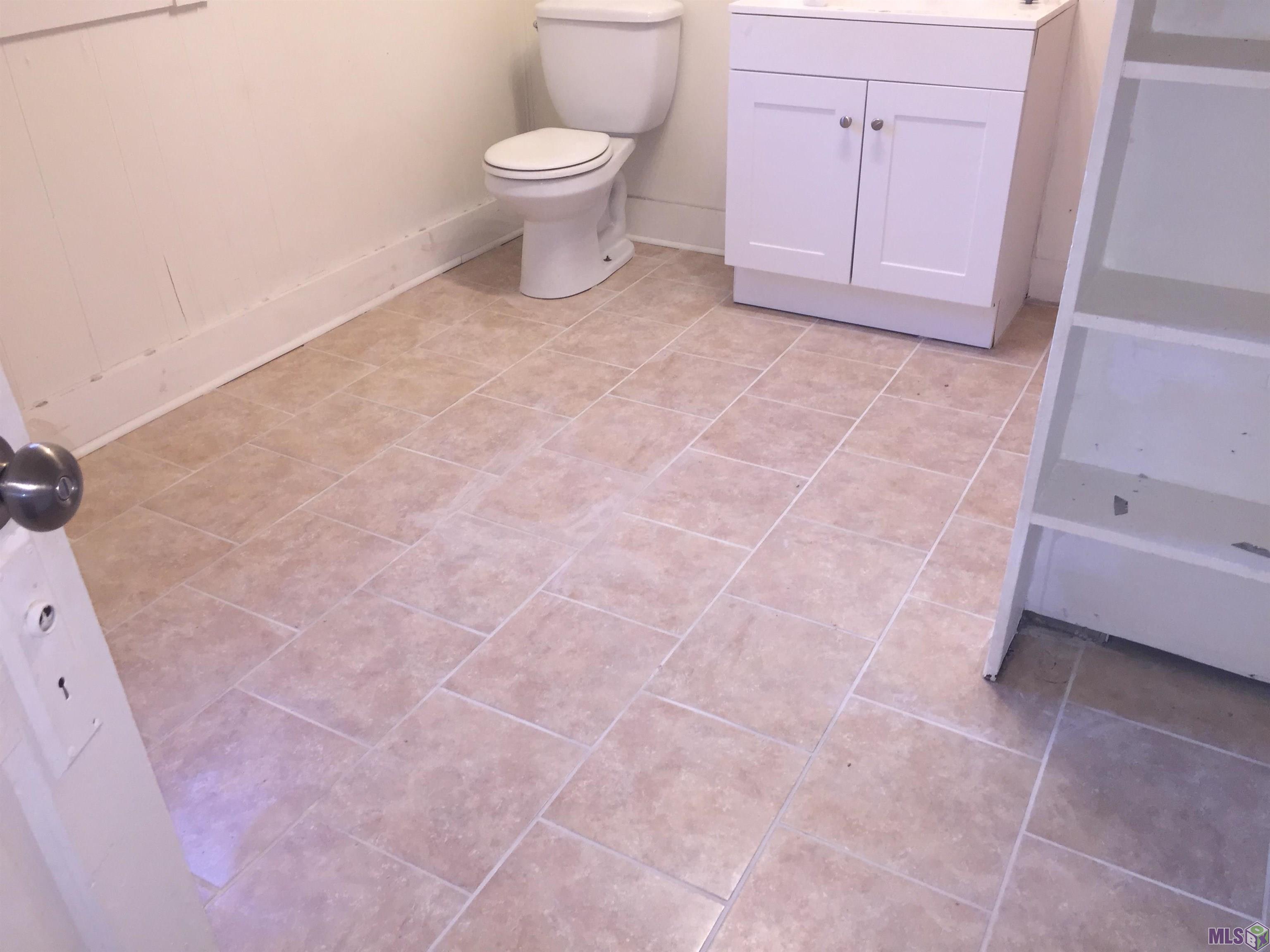 879 South Eugene Street, Unit 4 Baton Rouge, LA 70806 - Photo 29 of 39 Newly grouted tile floor in bathroom Unit 5