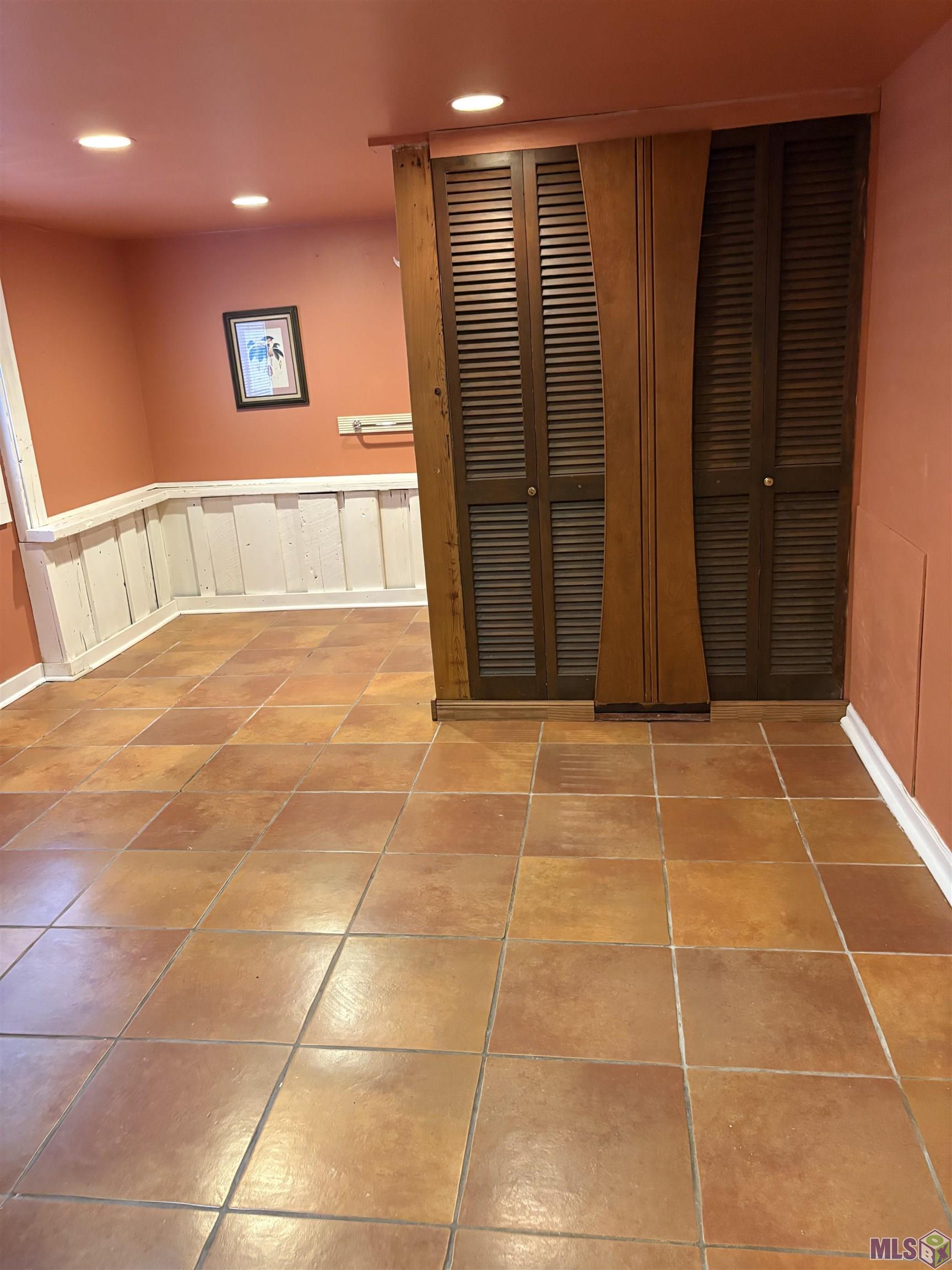 879 South Eugene Street, Unit 4 Baton Rouge, LA 70806 - Photo 7 of 39 Bedroom unit 3 with bath behind shutters.