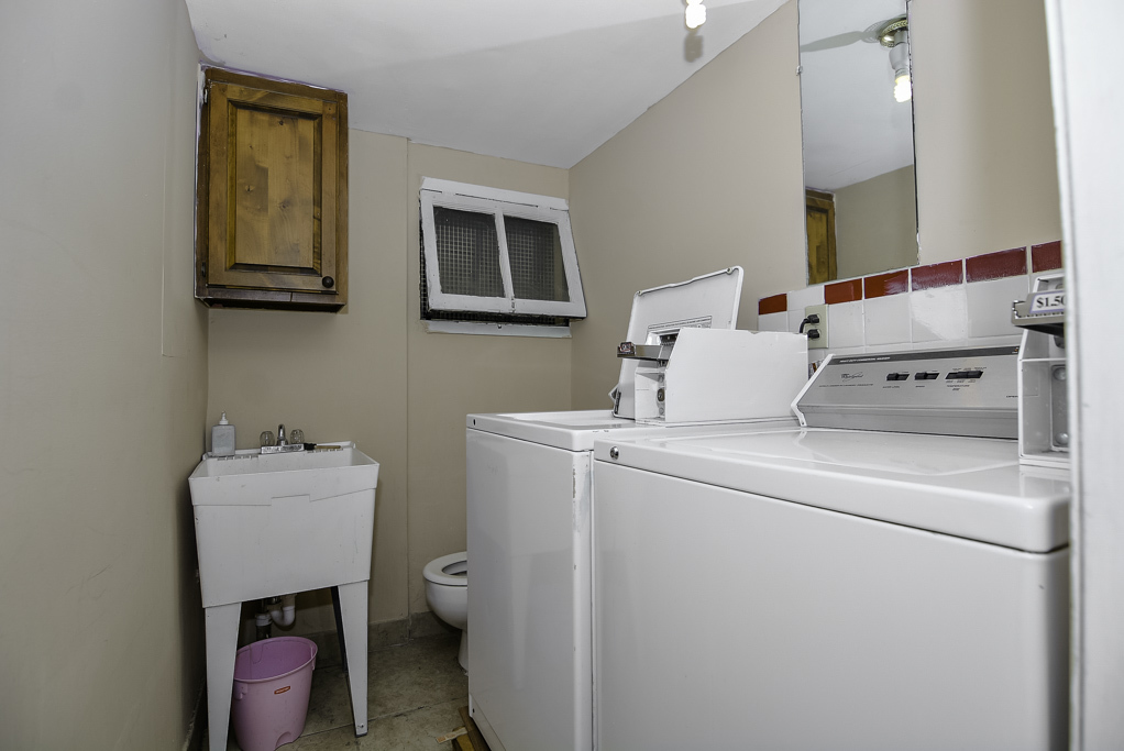 2145 West Chicago Avenue, Unit 2 Chicago, IL 60622 - Photo 18 of 19 a utility room with dryer and washer