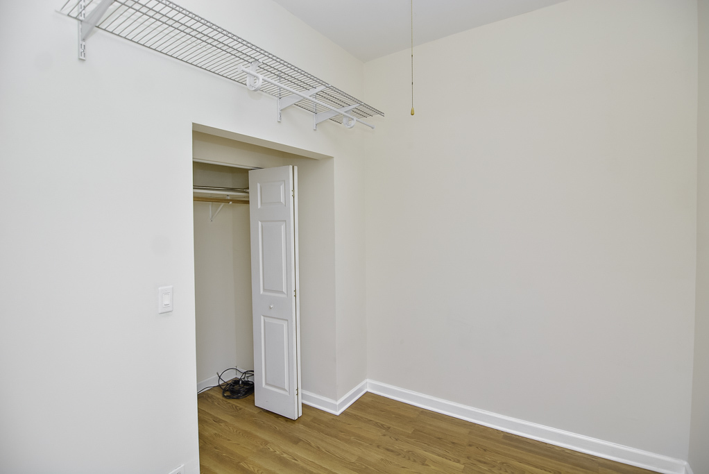 2145 West Chicago Avenue, Unit 2 Chicago, IL 60622 - Photo 9 of 19 a view of a small space with wooden floor