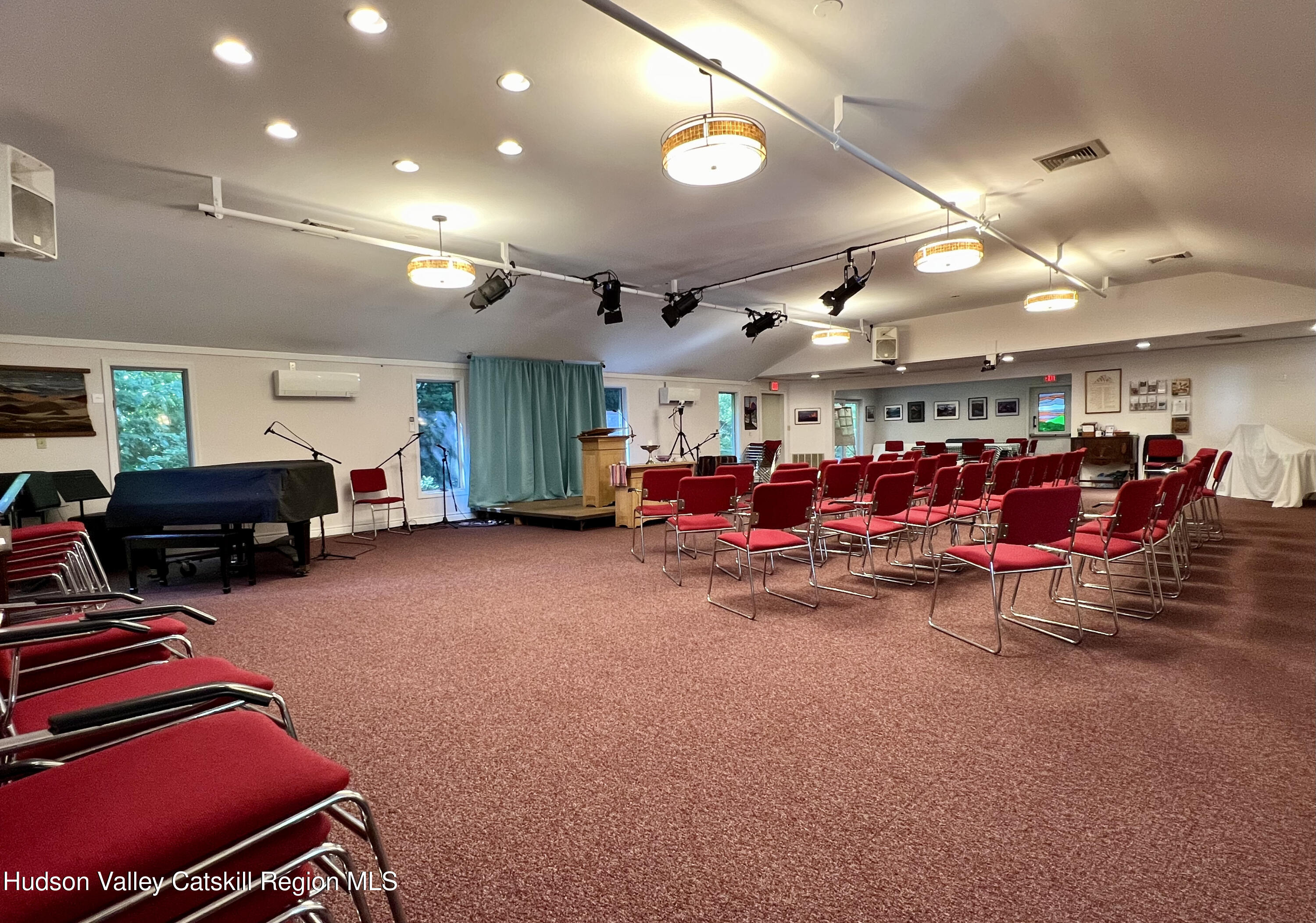 320 Sawkill Road Kingston, NY 12401 - Photo 13 of 45 a living room with lots of furniture and a chandelier