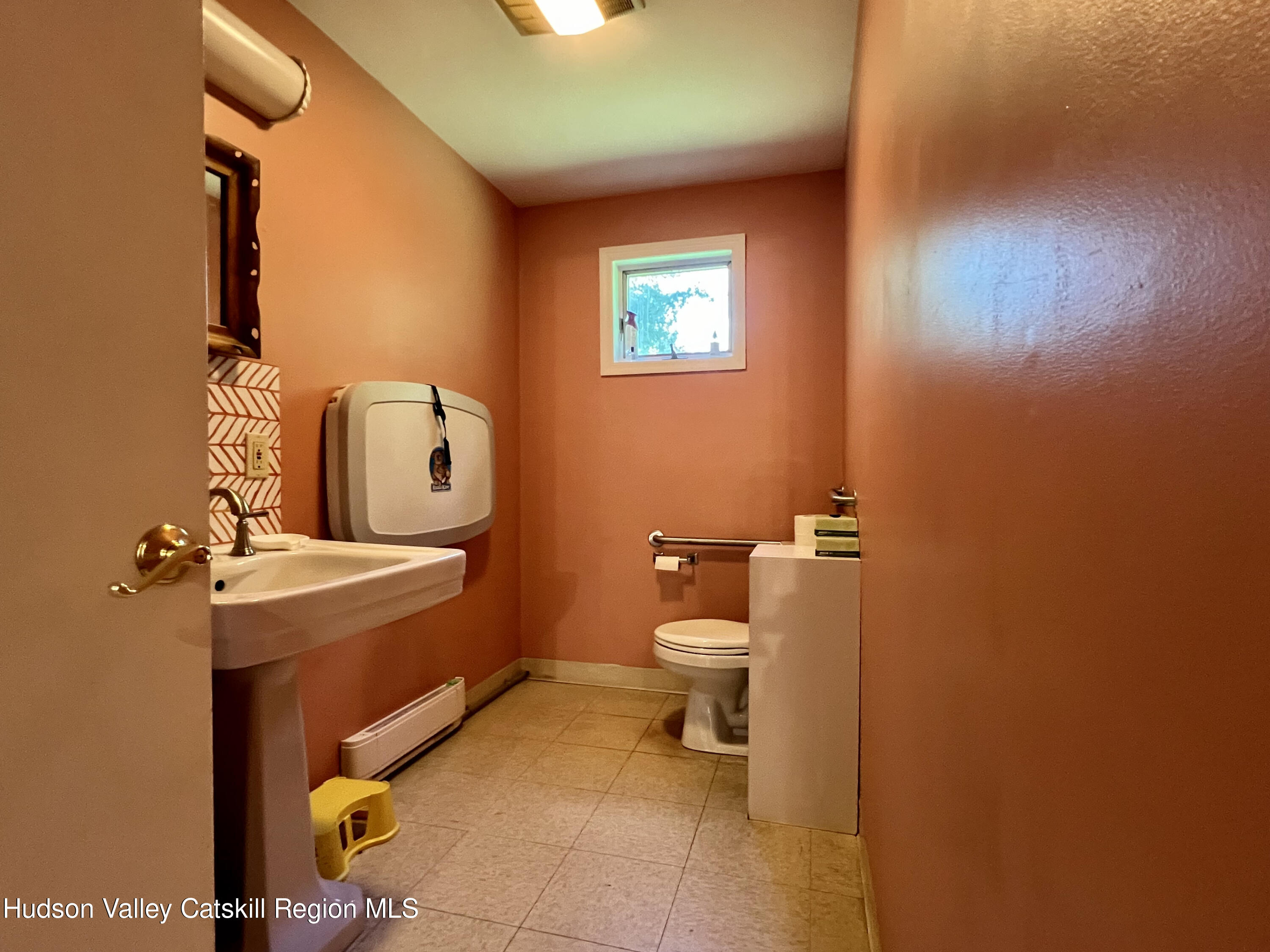 320 Sawkill Road Kingston, NY 12401 - Photo 14 of 45 a bathroom with a toilet a sink and mirror