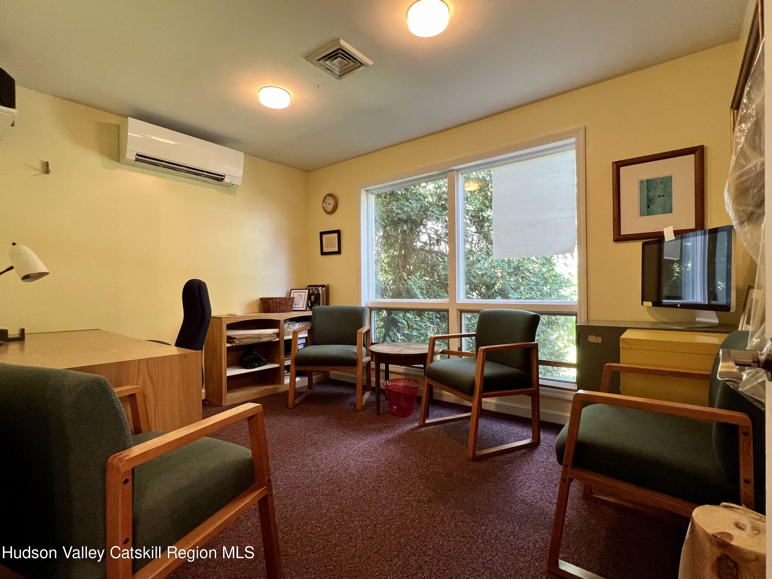320 Sawkill Road Kingston, NY 12401 - Photo 15 of 45 a living room with furniture a rug and a floor to ceiling window