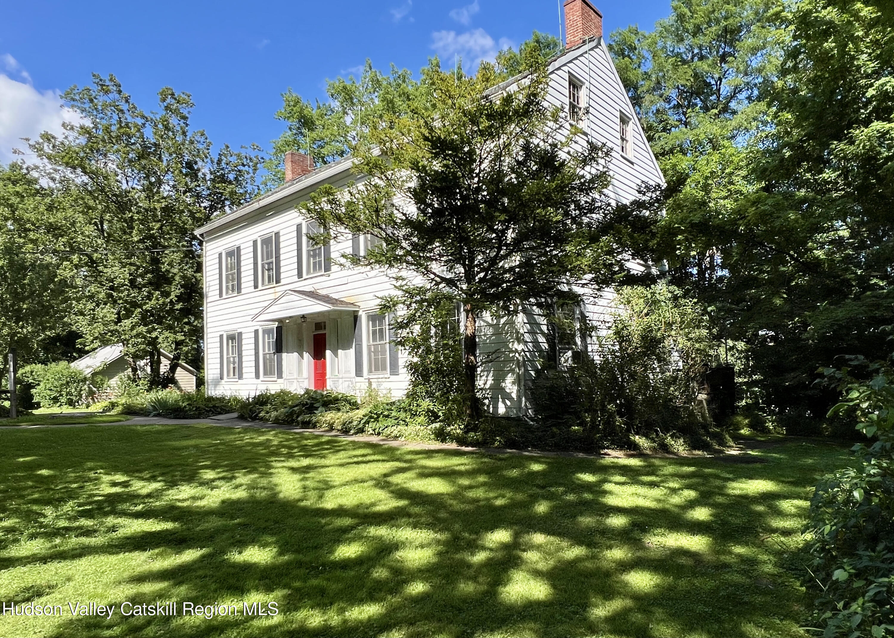 320 Sawkill Road Kingston, NY 12401 - Photo 21 of 45 a front view of a house with a yard