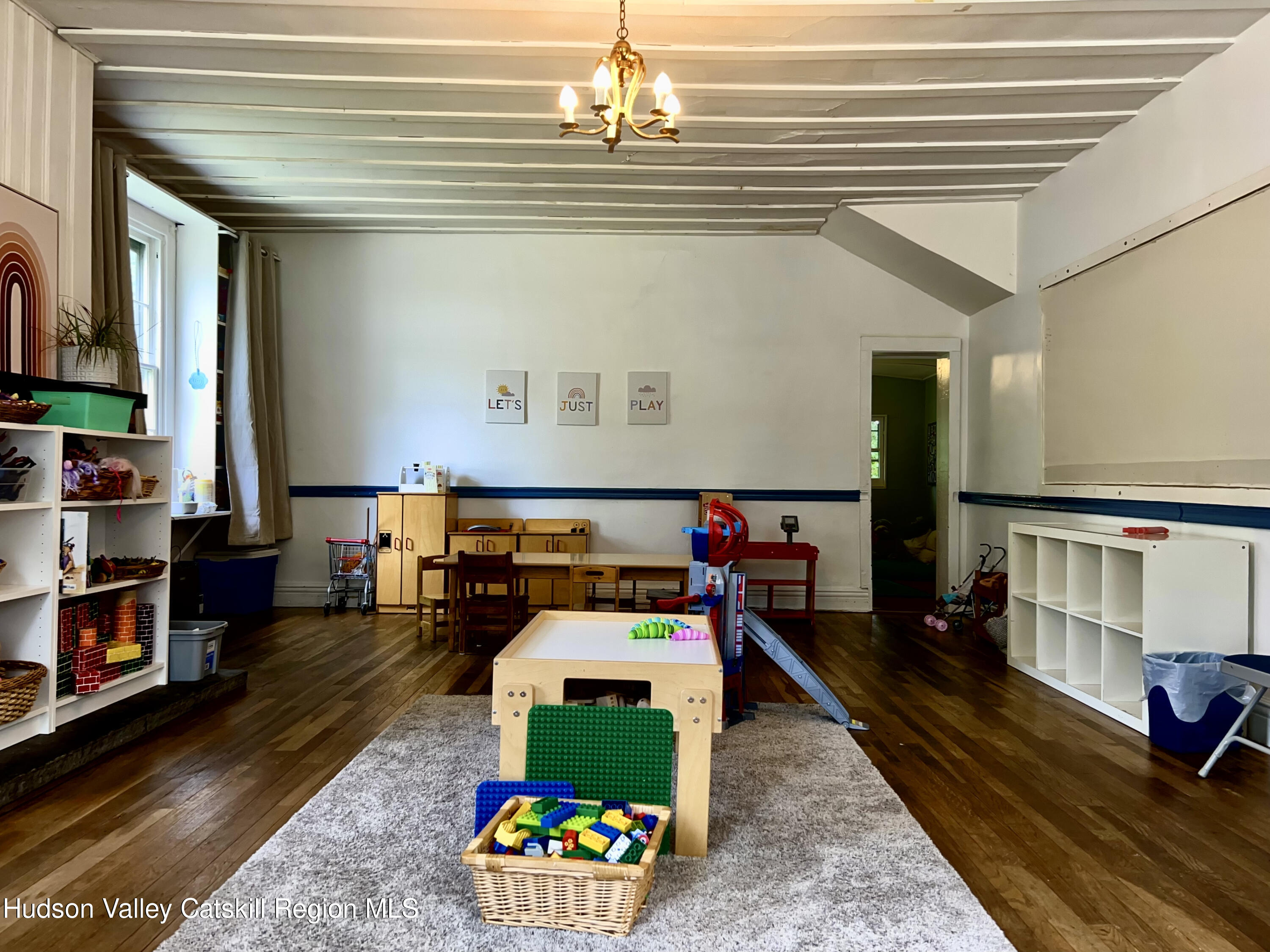 320 Sawkill Road Kingston, NY 12401 - Photo 36 of 45 a living room with furniture and a wooden floor