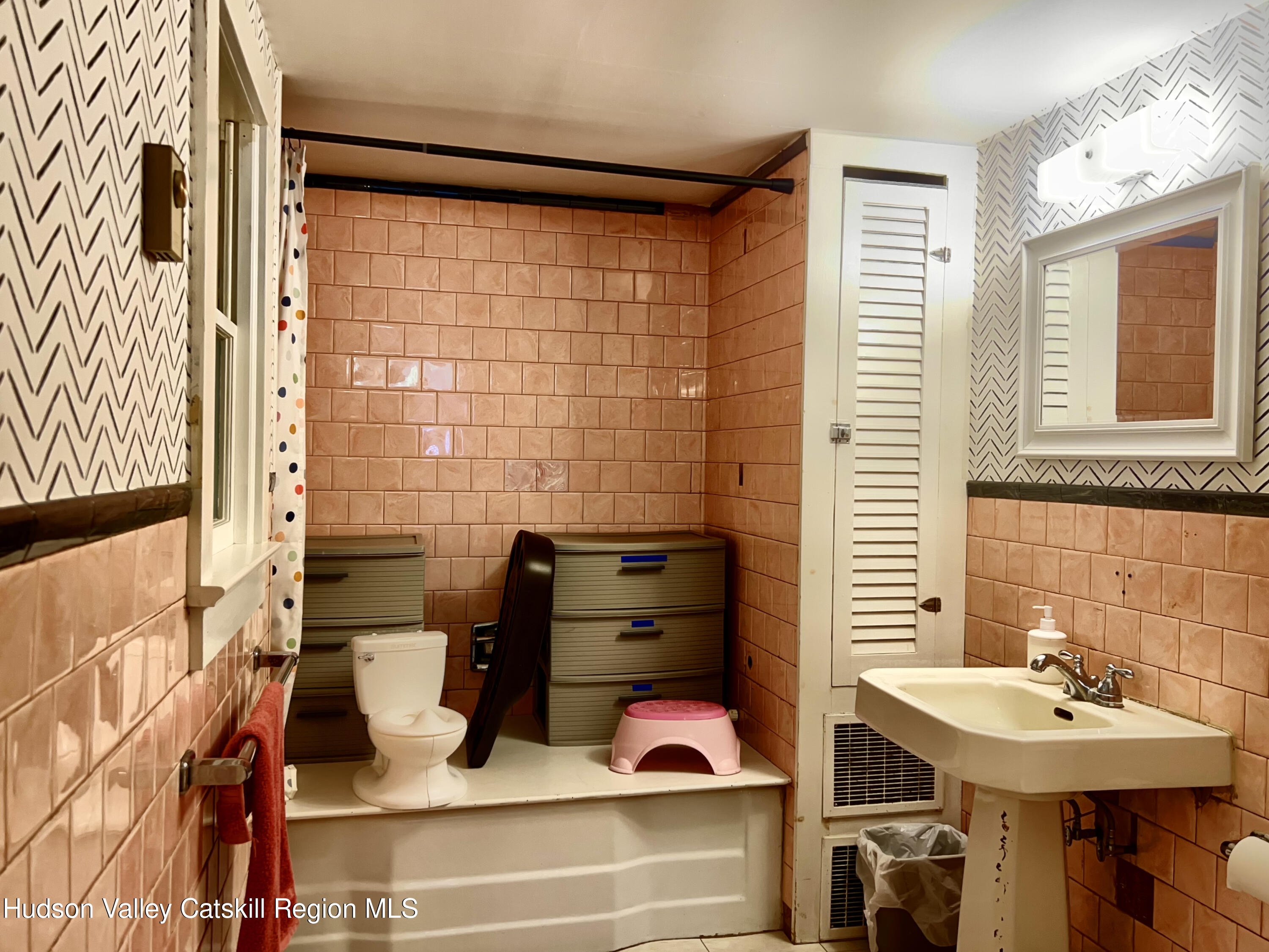 320 Sawkill Road Kingston, NY 12401 - Photo 38 of 45 a bathroom with a sink and a mirror