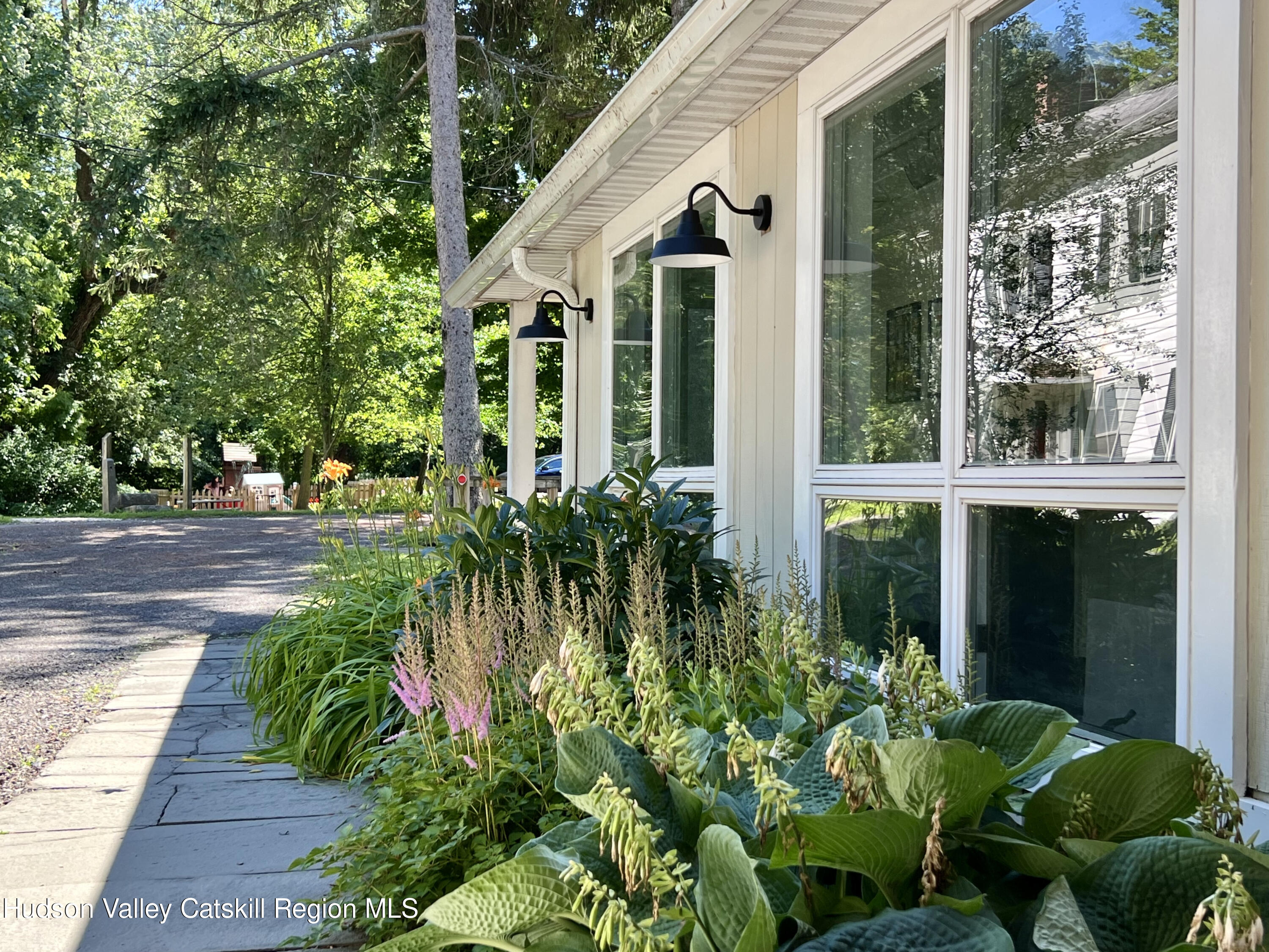 320 Sawkill Road Kingston, NY 12401 - Photo 6 of 45 a front view of a house with a yard