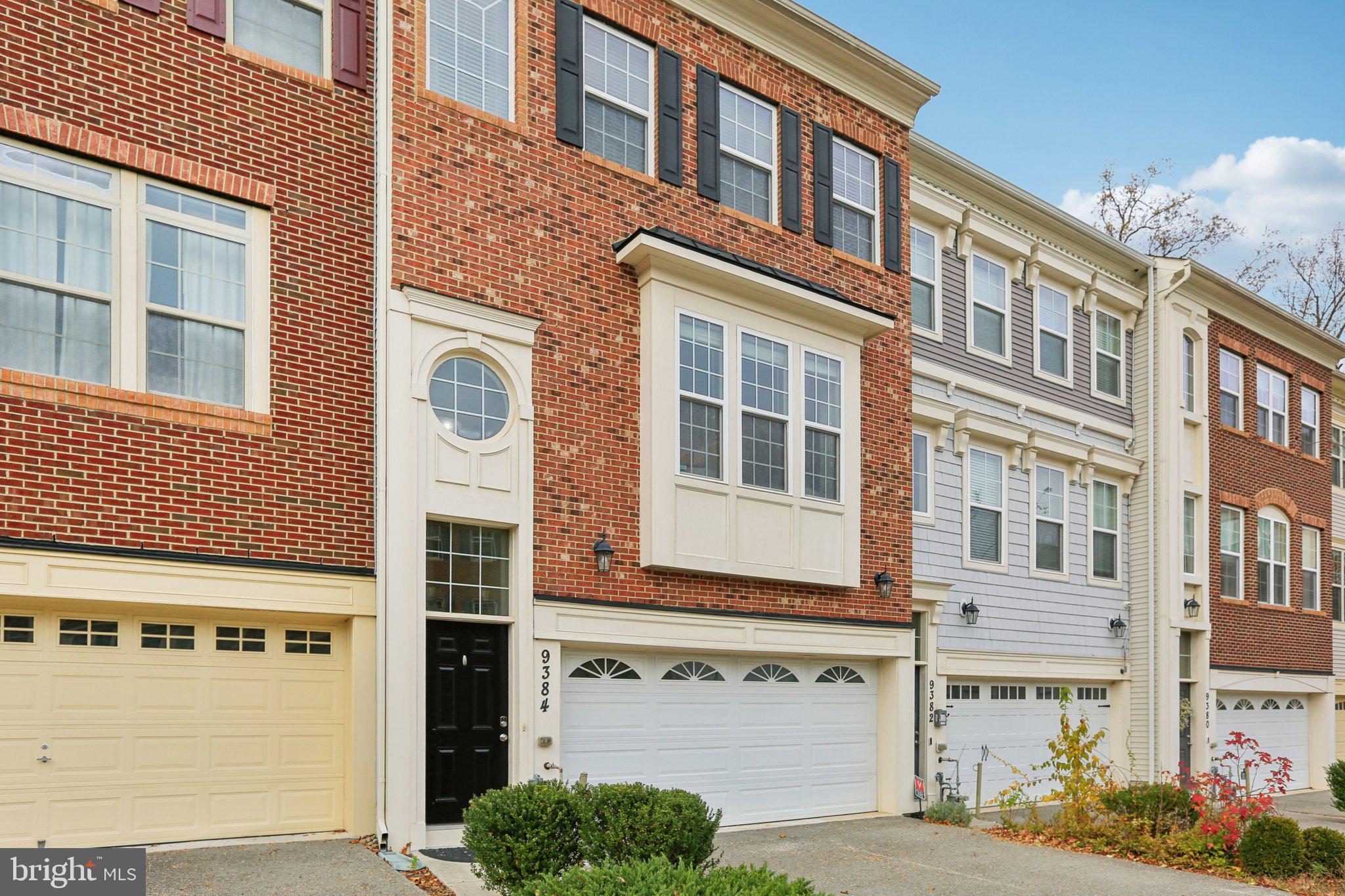 Charming brick-front townhouse elegance.