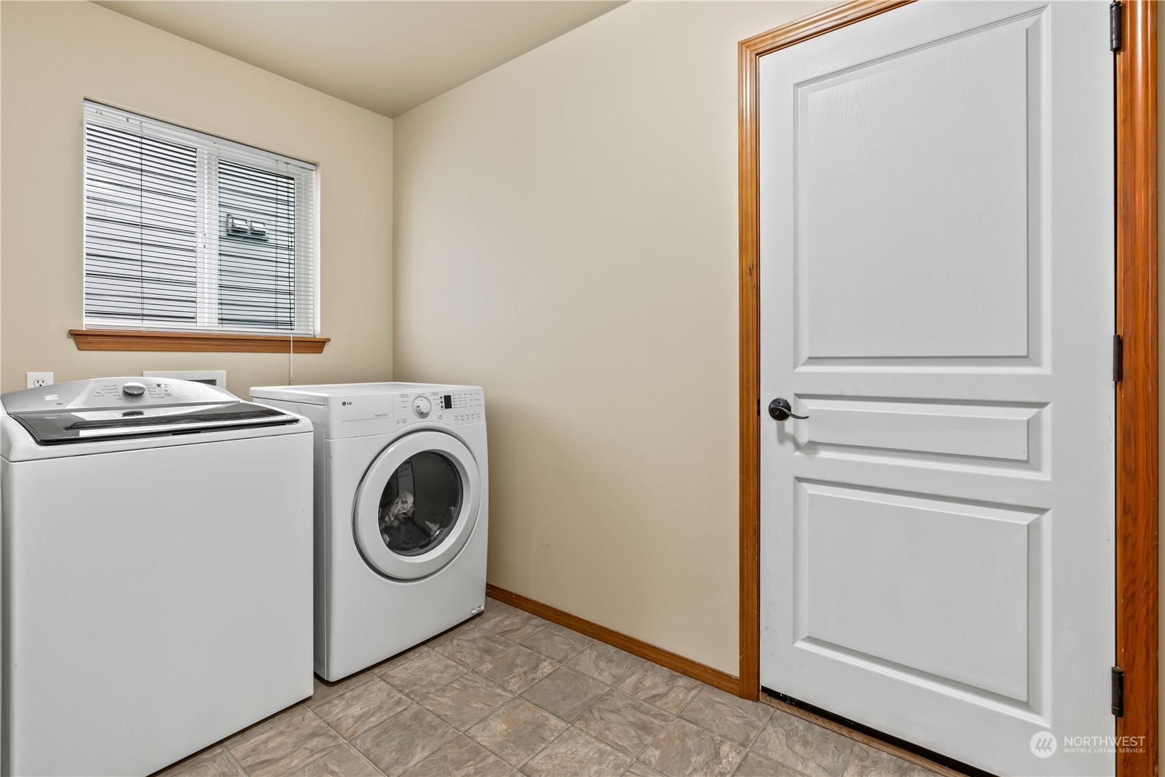 8226 Racca Court Southeast Olympia, WA 98513 - Photo 16 of 40 a utility room with dryer and washer
