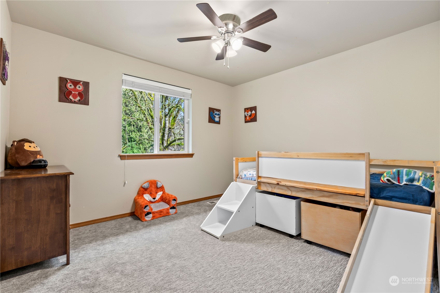 8226 Racca Court Southeast Olympia, WA 98513 - Photo 25 of 40 a bedroom with furniture and a window