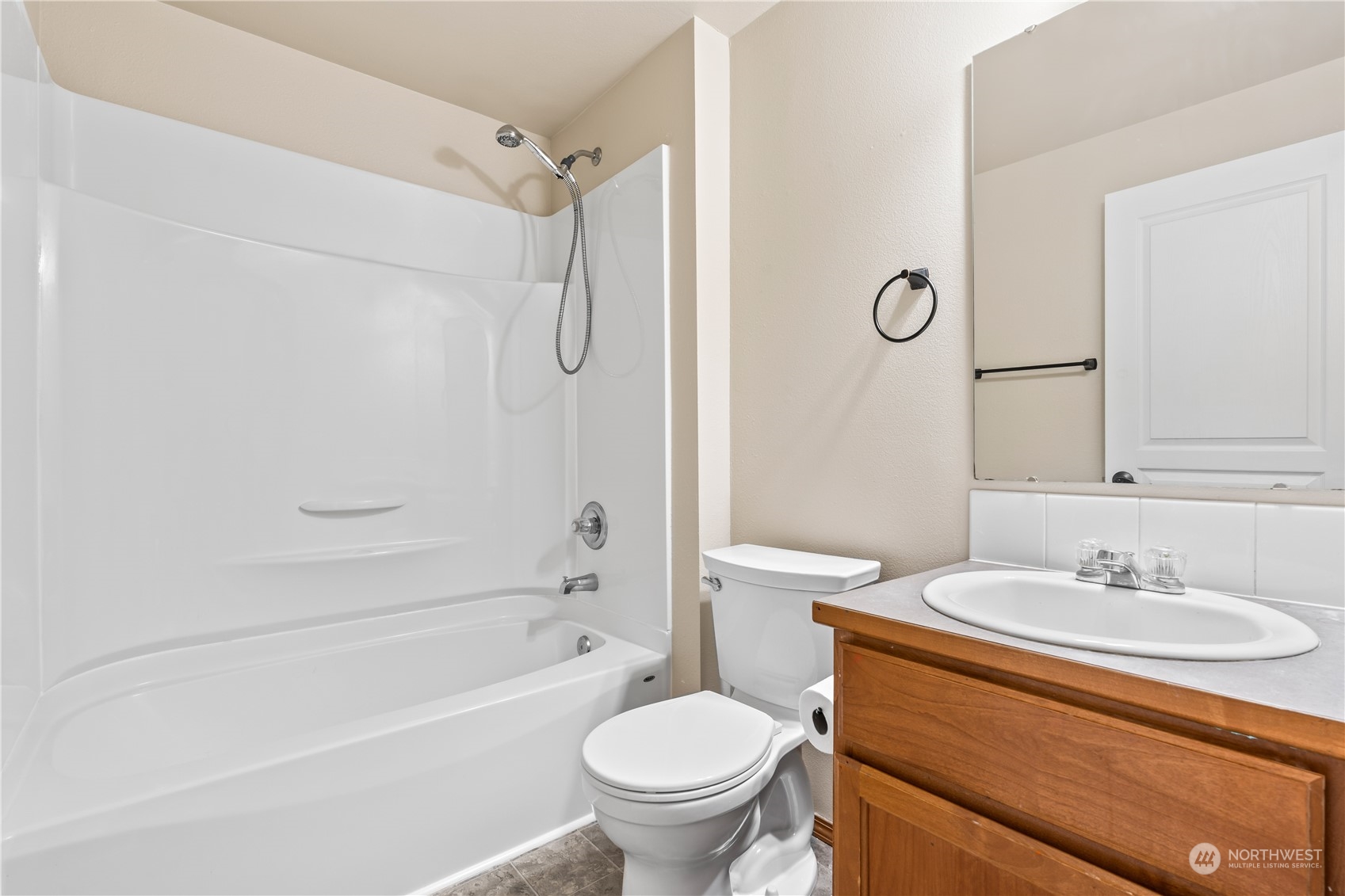 8226 Racca Court Southeast Olympia, WA 98513 - Photo 26 of 40 a bathroom with a sink toilet and a bathtub