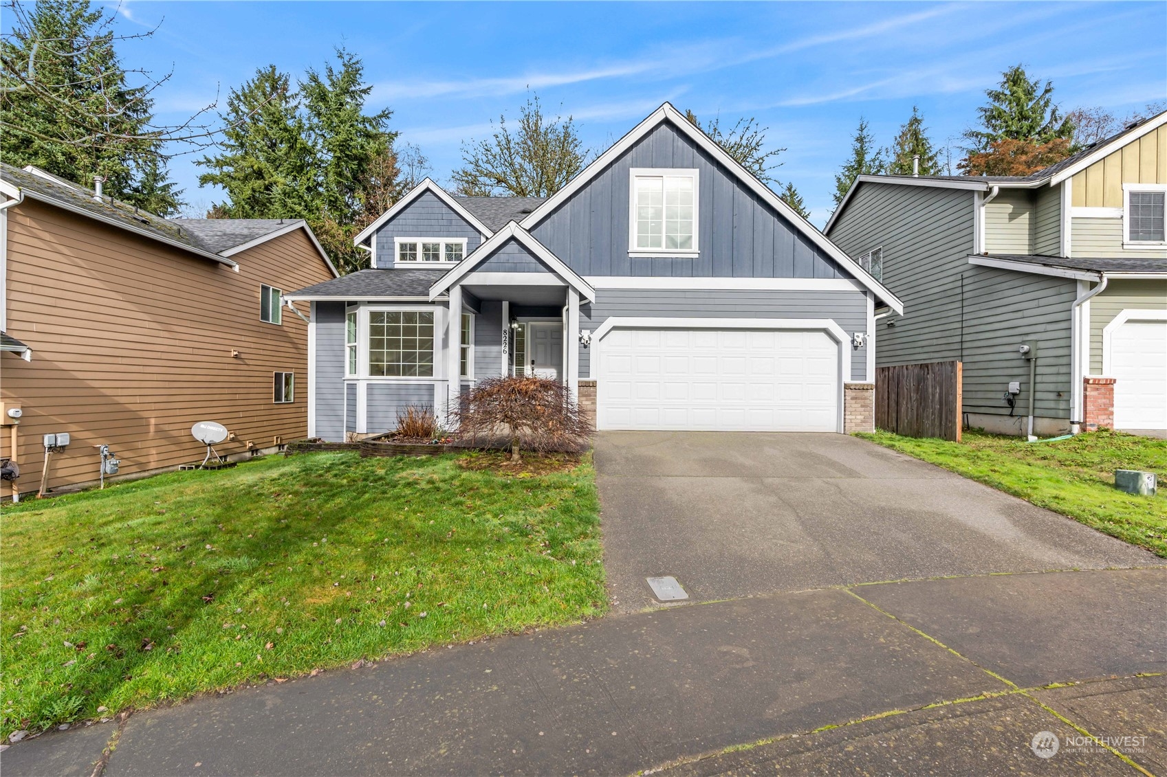 8226 Racca Court Southeast Olympia, WA 98513 - Photo 33 of 40 a front view of a house with a garden