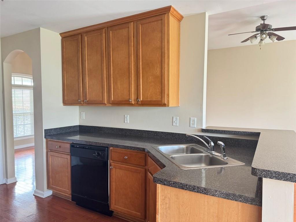 5432 Village Ridge Fairburn, GA 30213 - Photo 9 of 18 a kitchen with granite countertop a sink and a cabinets
