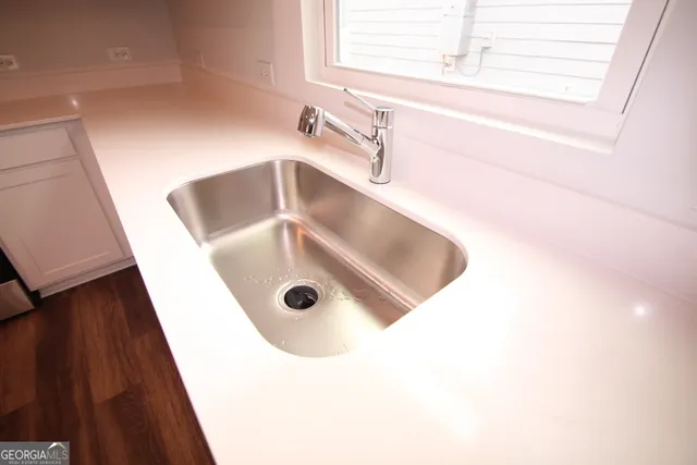 a bathroom with a sink and a tub