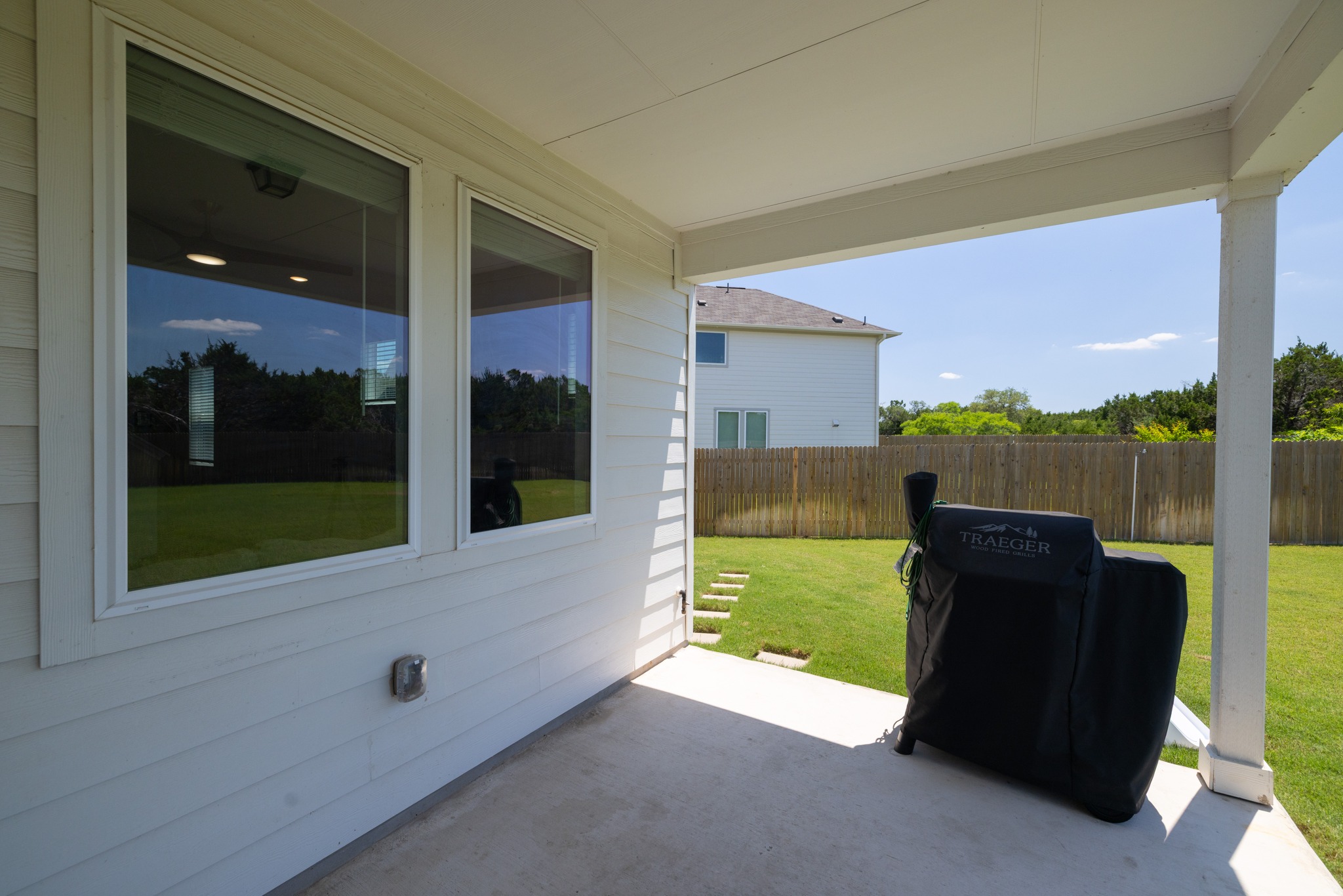 2049 Winston Way Leander, TX 78641 - Photo 24 of 35 Covered back patio has a gas stub for future built-in grill/fireplace or outdoor kitchen.