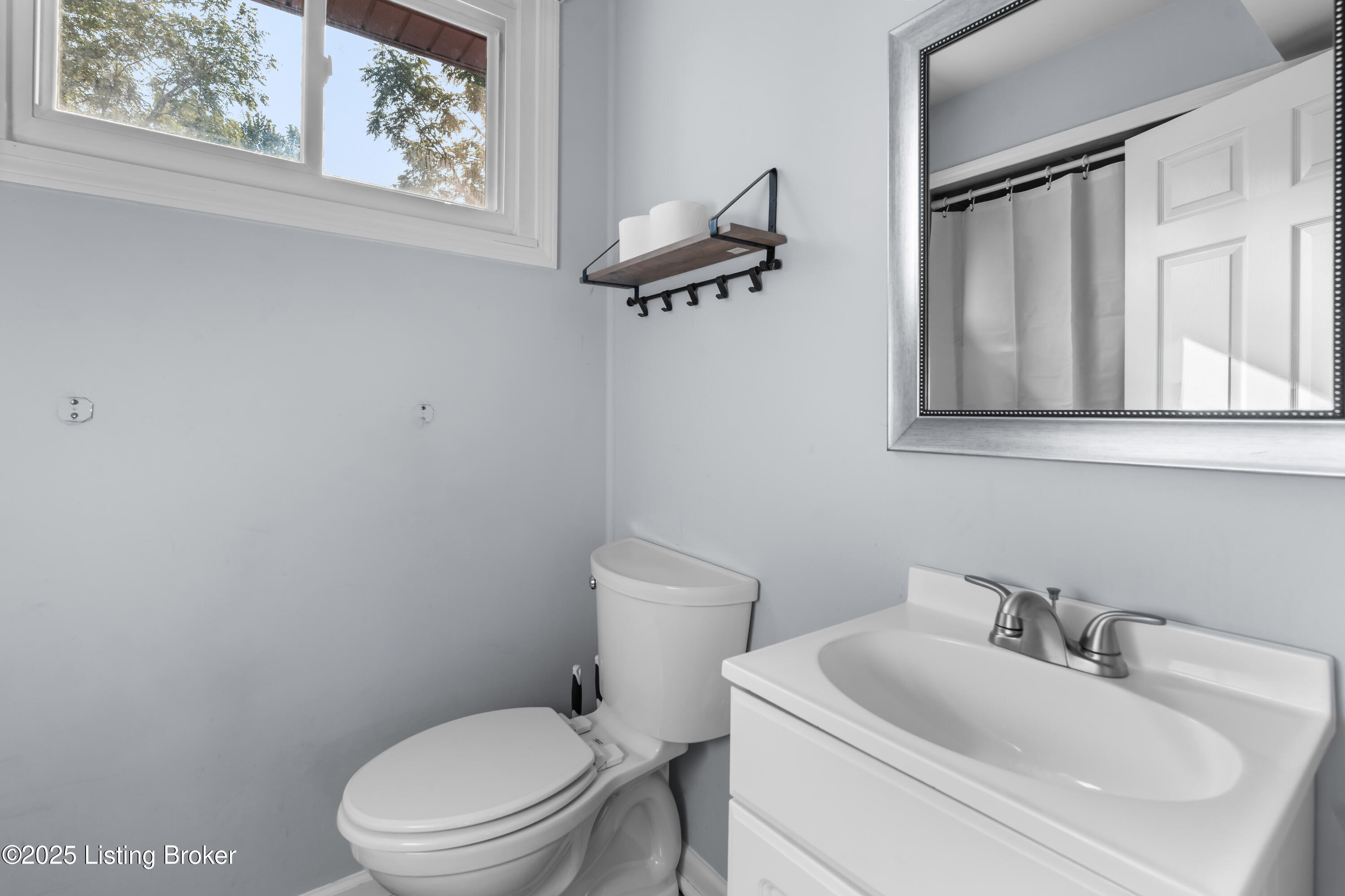 823 Creek Valley Road Louisville, KY 40243 - Photo 25 of 40 Downstairs bath which includes washer and dryer.