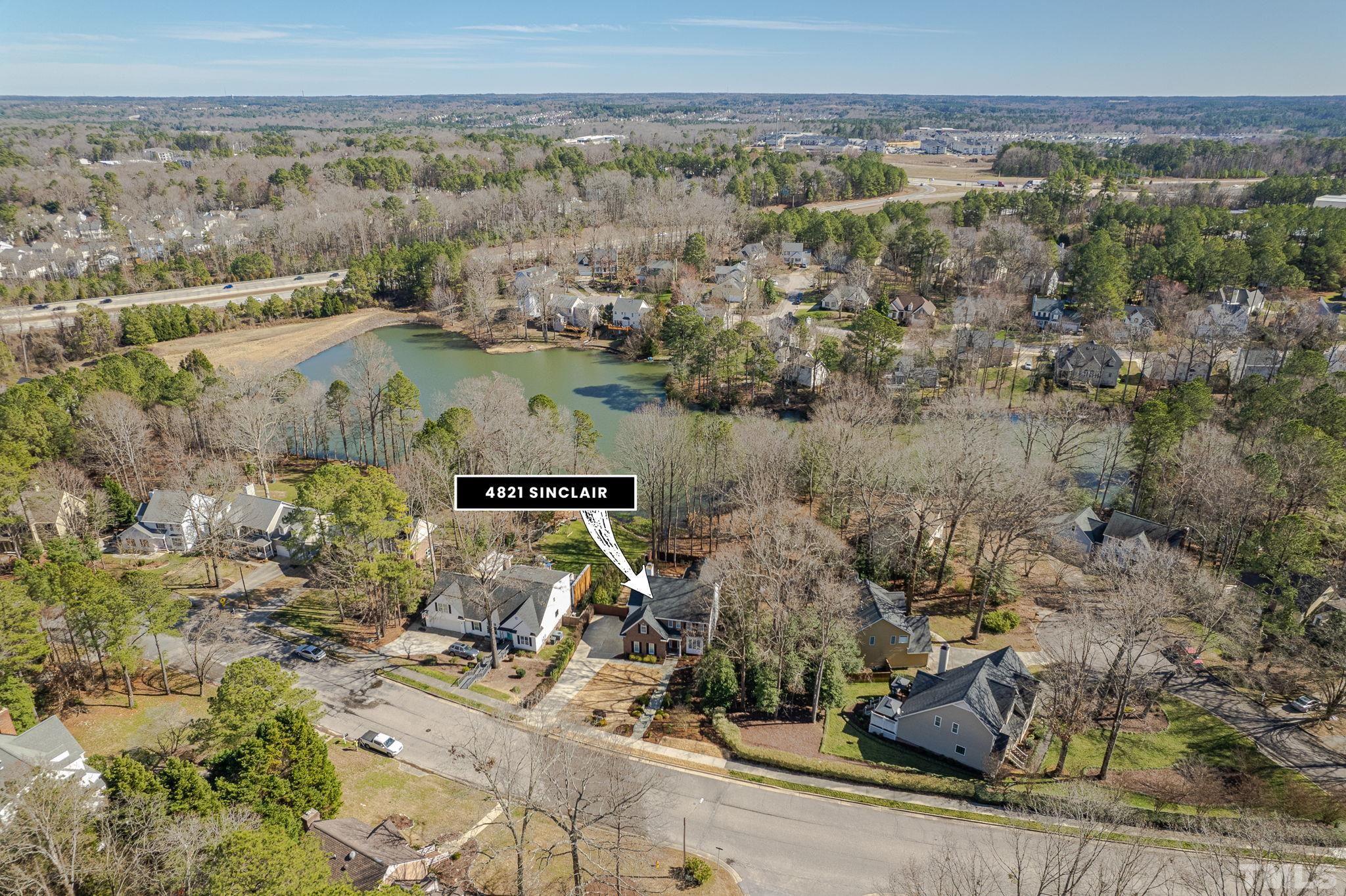 4821 Sinclair Drive Raleigh, NC 27616 - Photo 54 of 58 an aerial view of a house with a yard