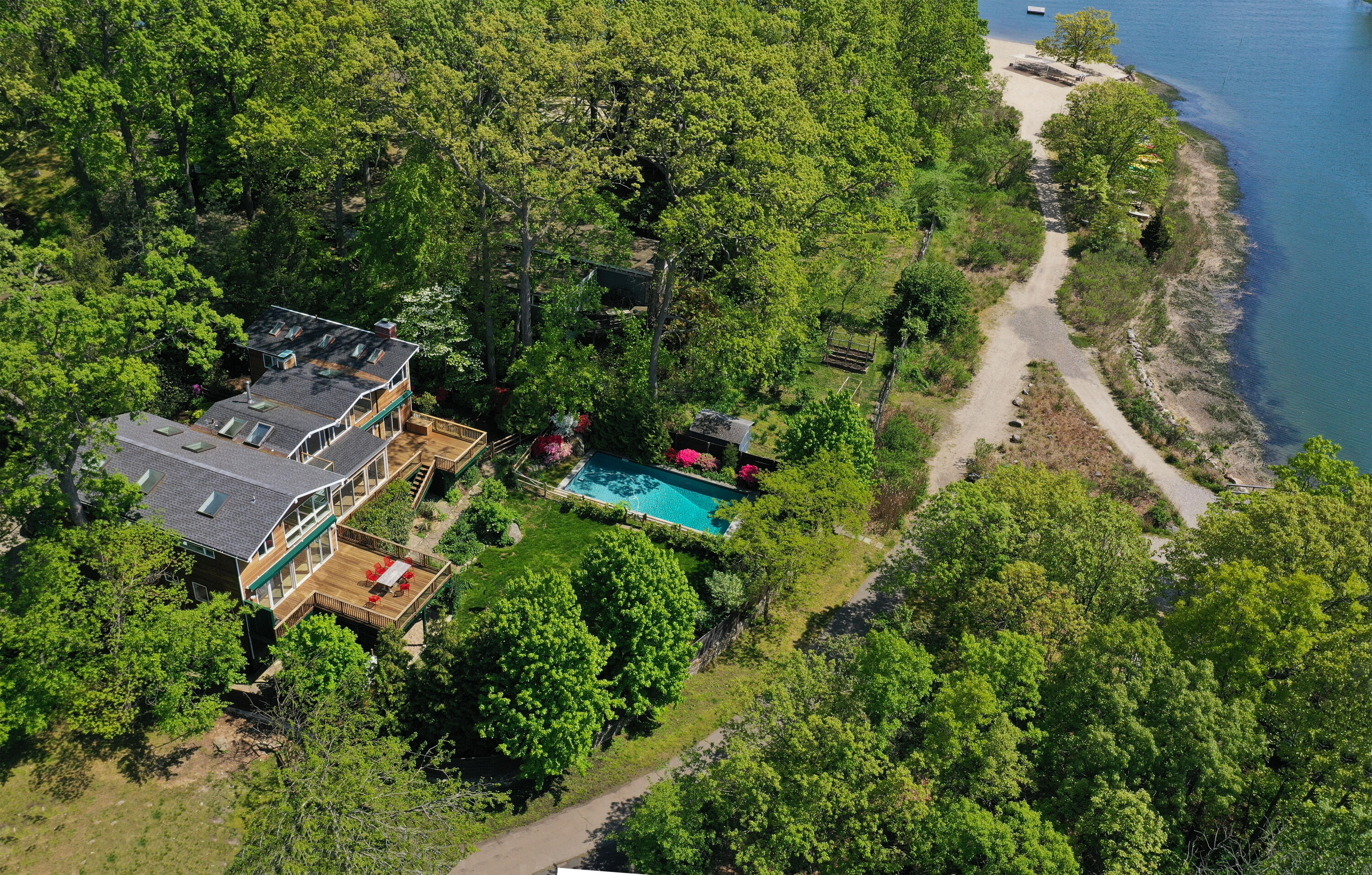 an aerial view of house with yard