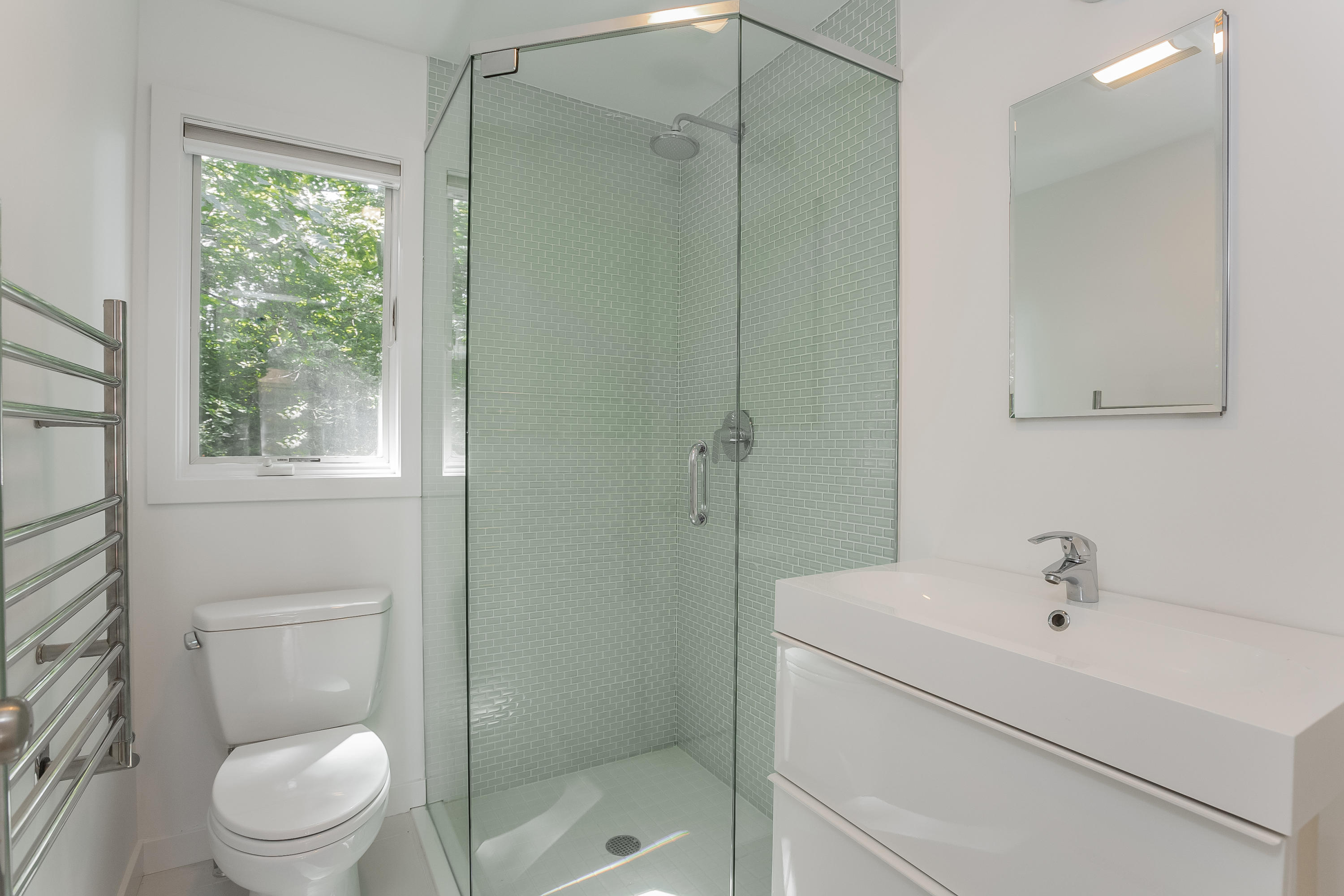 8 Outer Road Norwalk, CT 06854 - Photo 21 of 39 a bathroom with a sink a toilet and shower