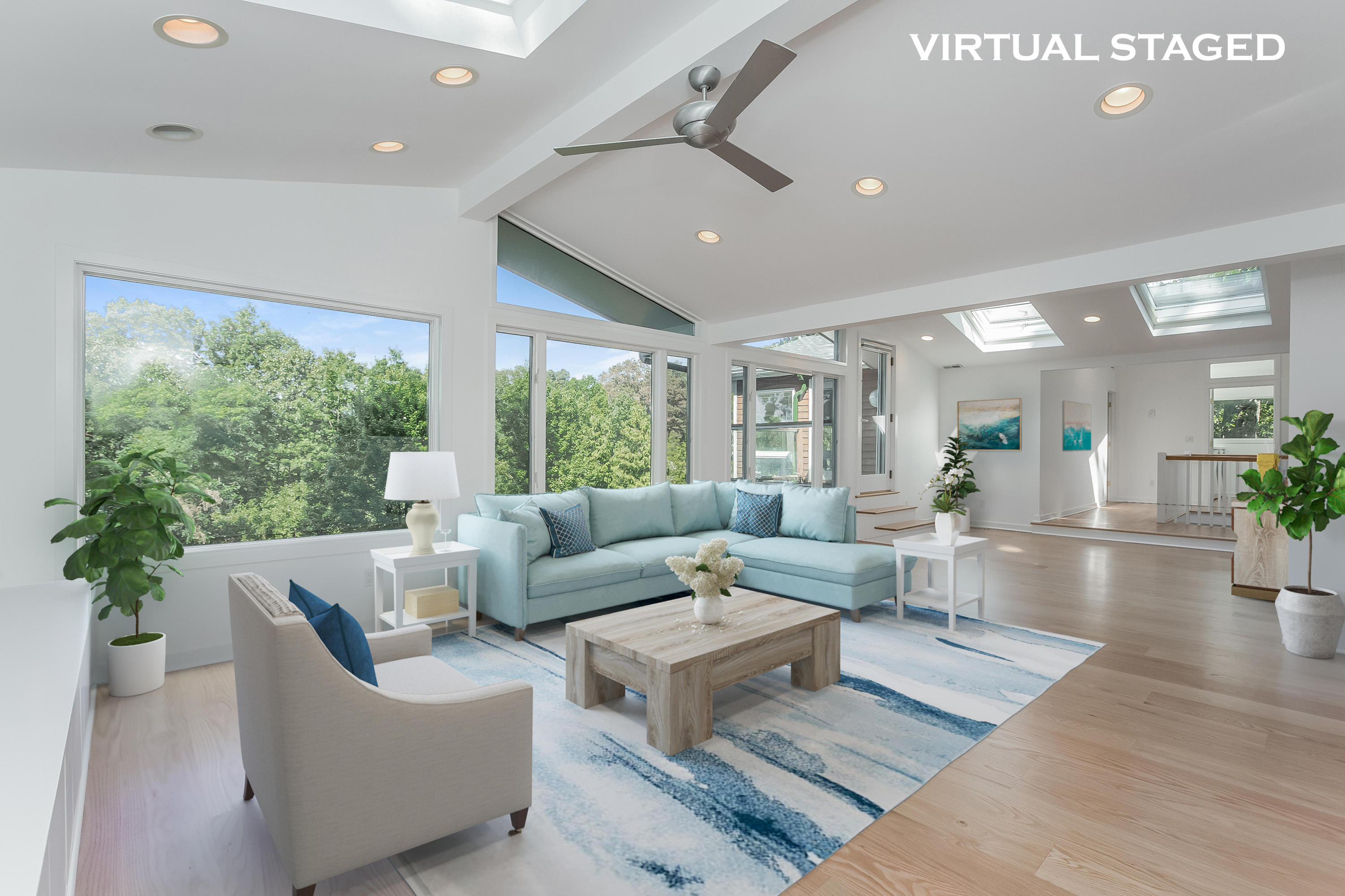 8 Outer Road Norwalk, CT 06854 - Photo 22 of 39 a living room with furniture and a large window