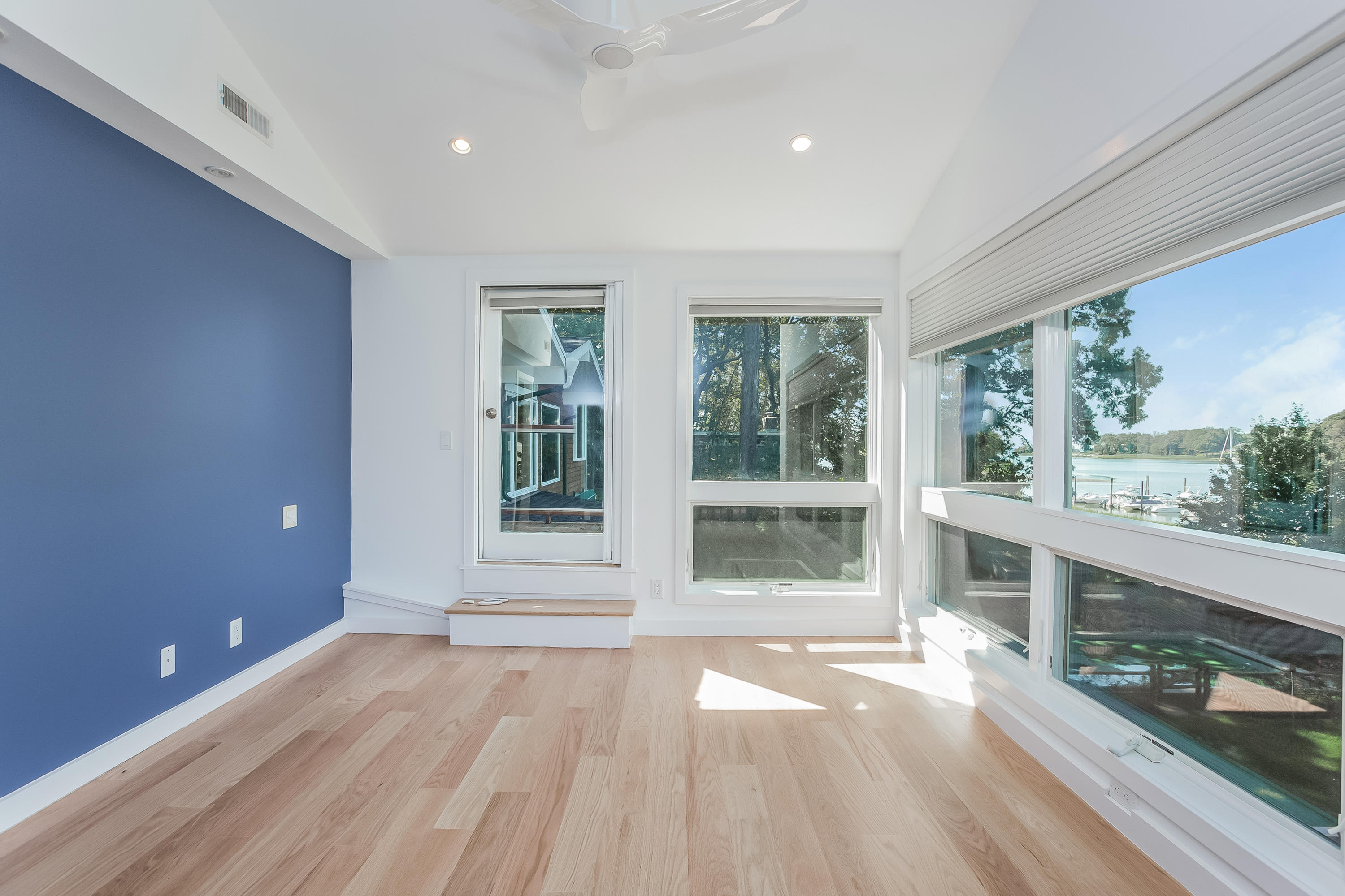 8 Outer Road Norwalk, CT 06854 - Photo 24 of 39 a view of empty room with wooden floor and fan
