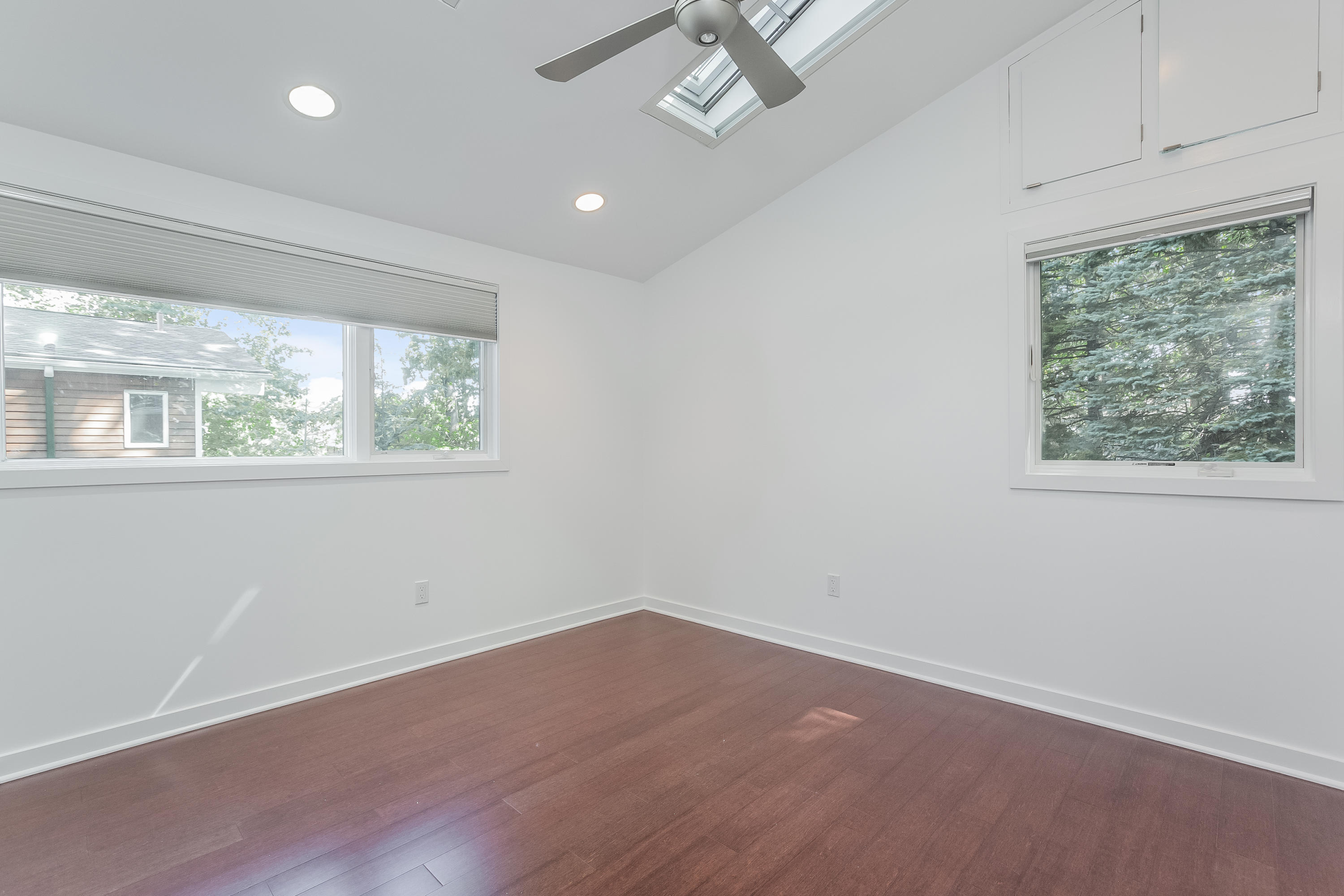 8 Outer Road Norwalk, CT 06854 - Photo 28 of 39 an empty room with wooden floor and windows