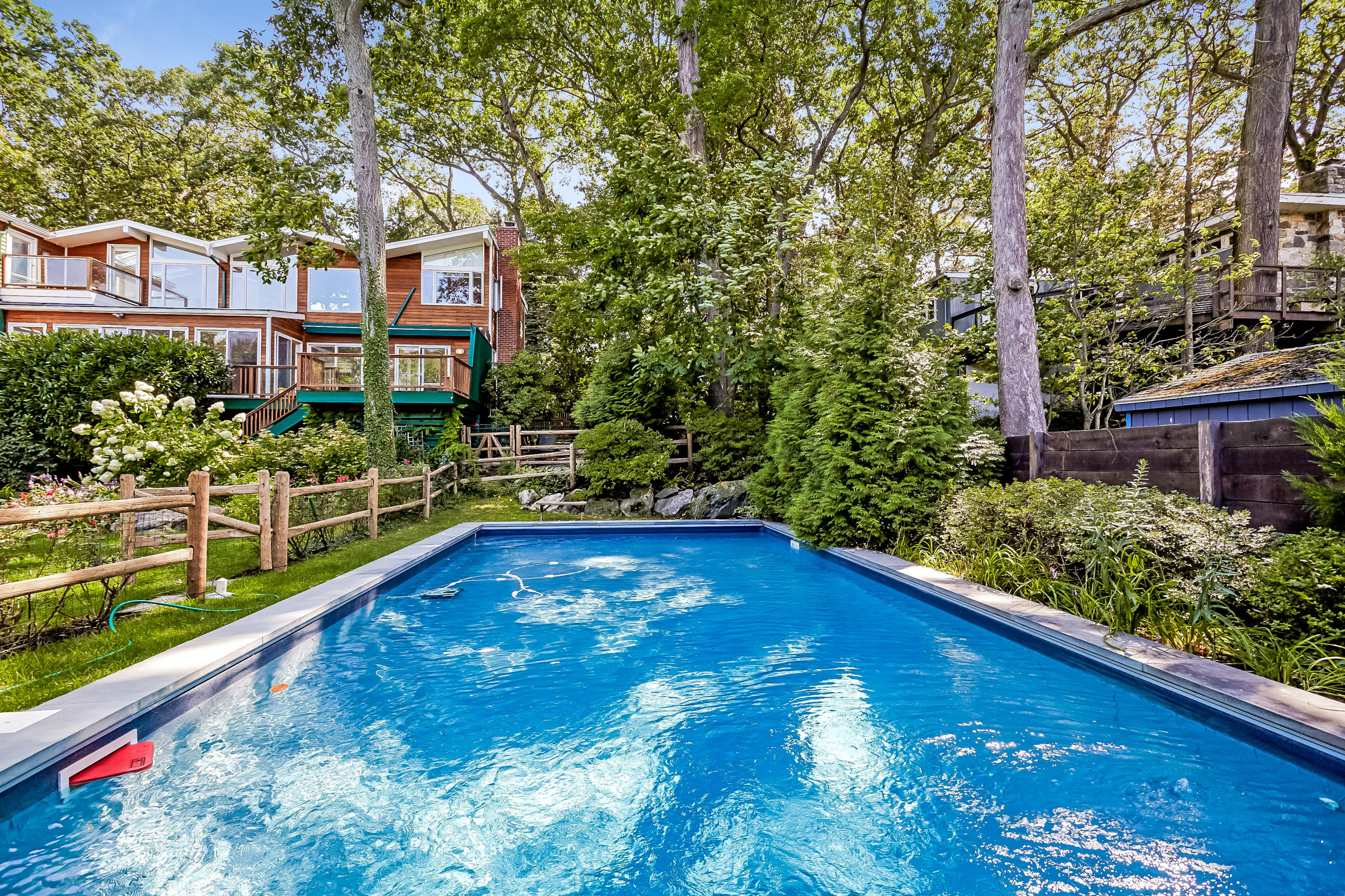 8 Outer Road Norwalk, CT 06854 - Photo 31 of 39 a view of a swimming pool with a patio and a yard