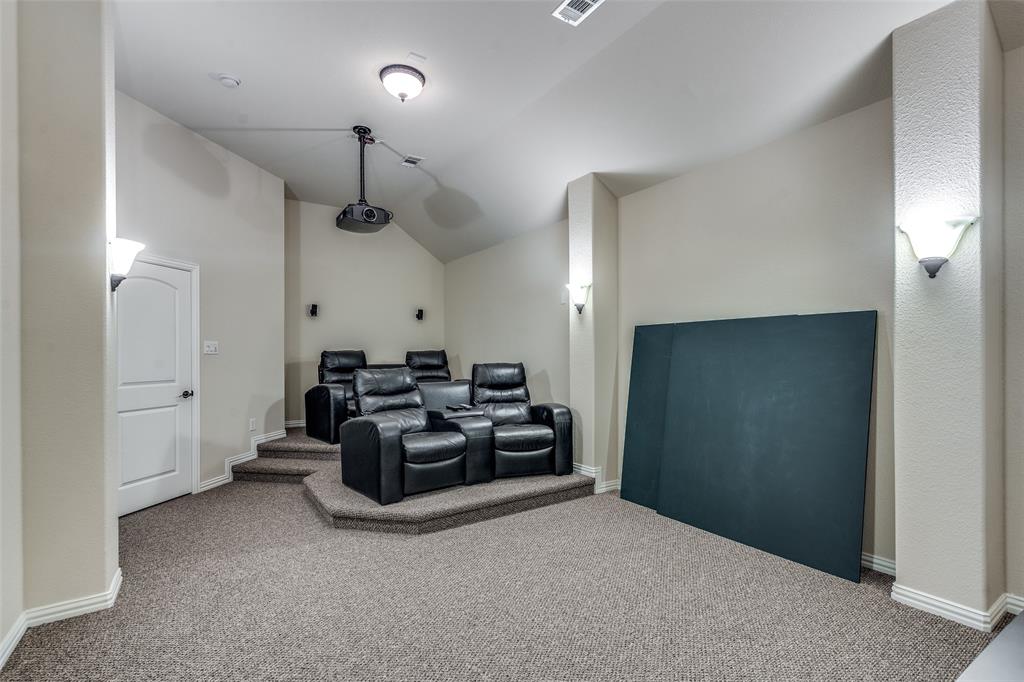 7504 Grace Avenue Plano, TX 75024 - Photo 19 of 36 a living room with furniture