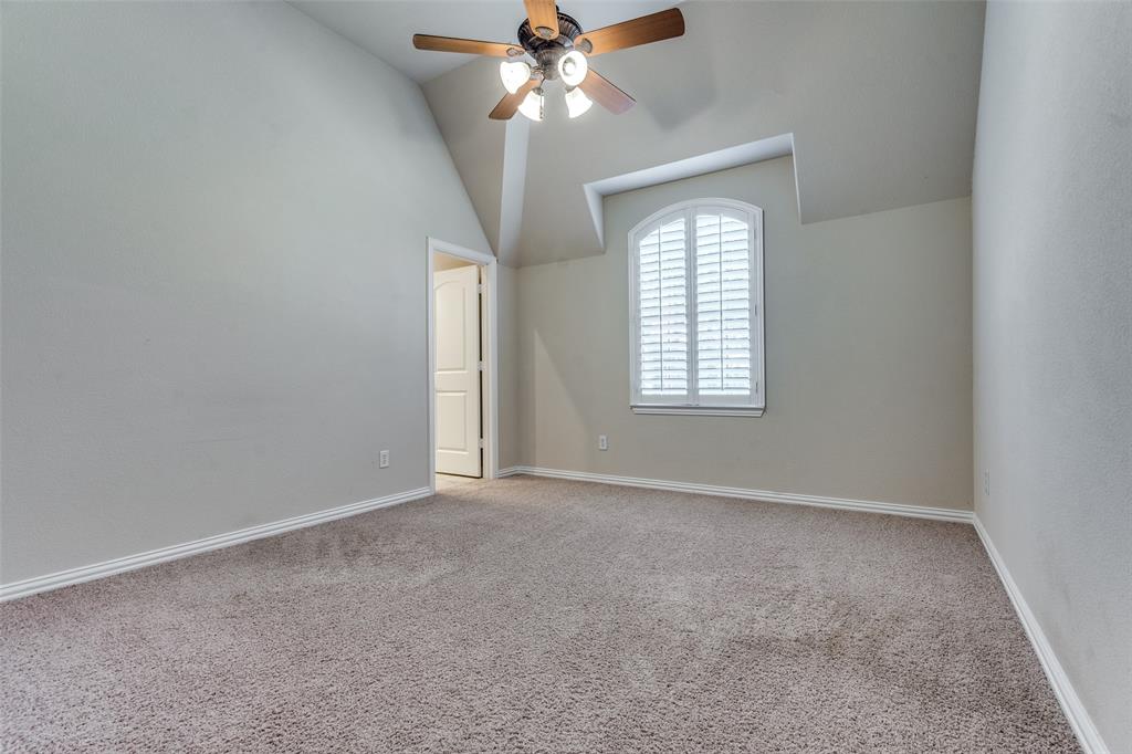 7504 Grace Avenue Plano, TX 75024 - Photo 28 of 36 an empty room with windows and fan
