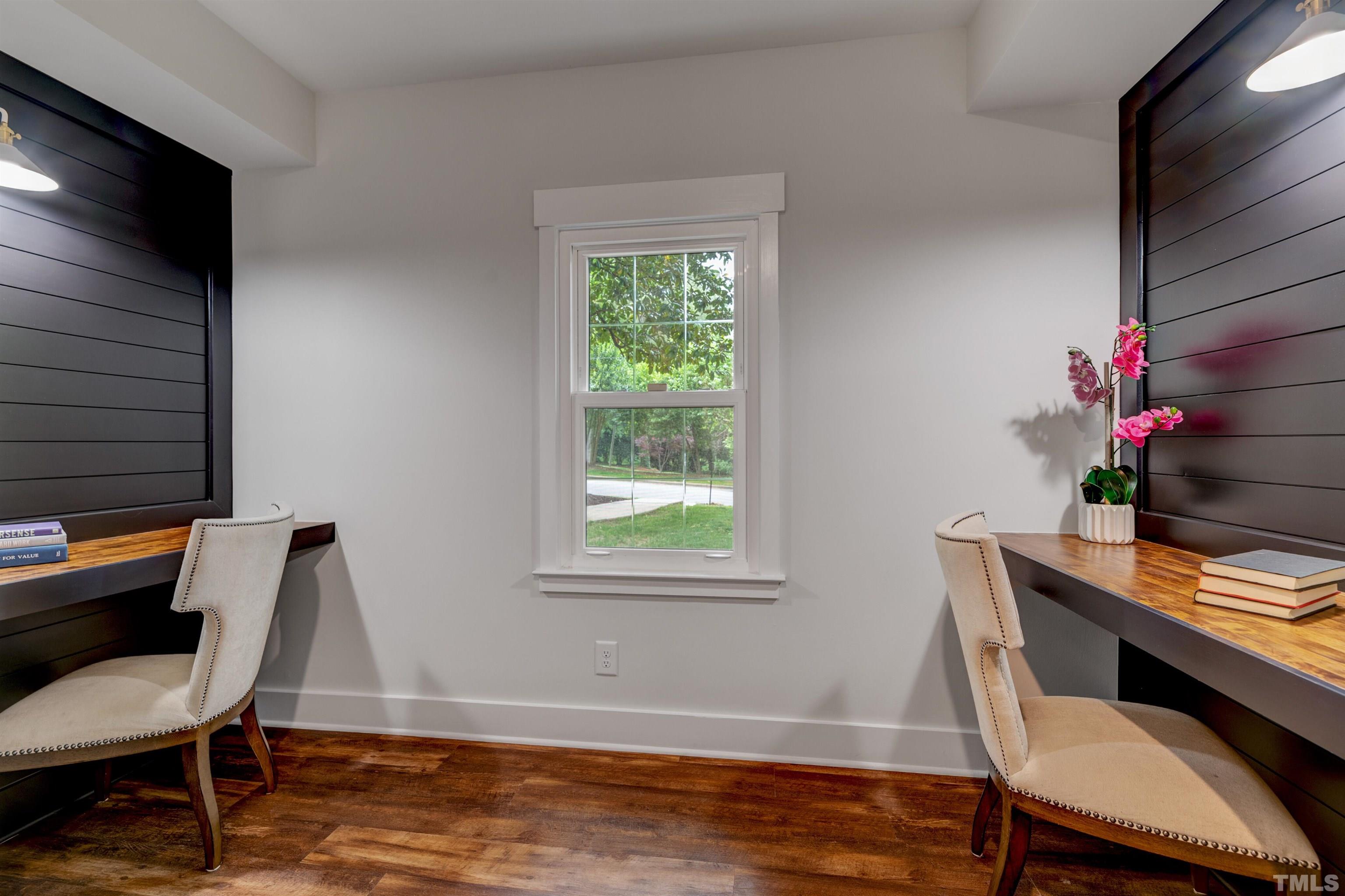 5400 Farley Drive Raleigh, NC 27609 - Photo 19 of 31 a workspace room with furniture and wooden floor