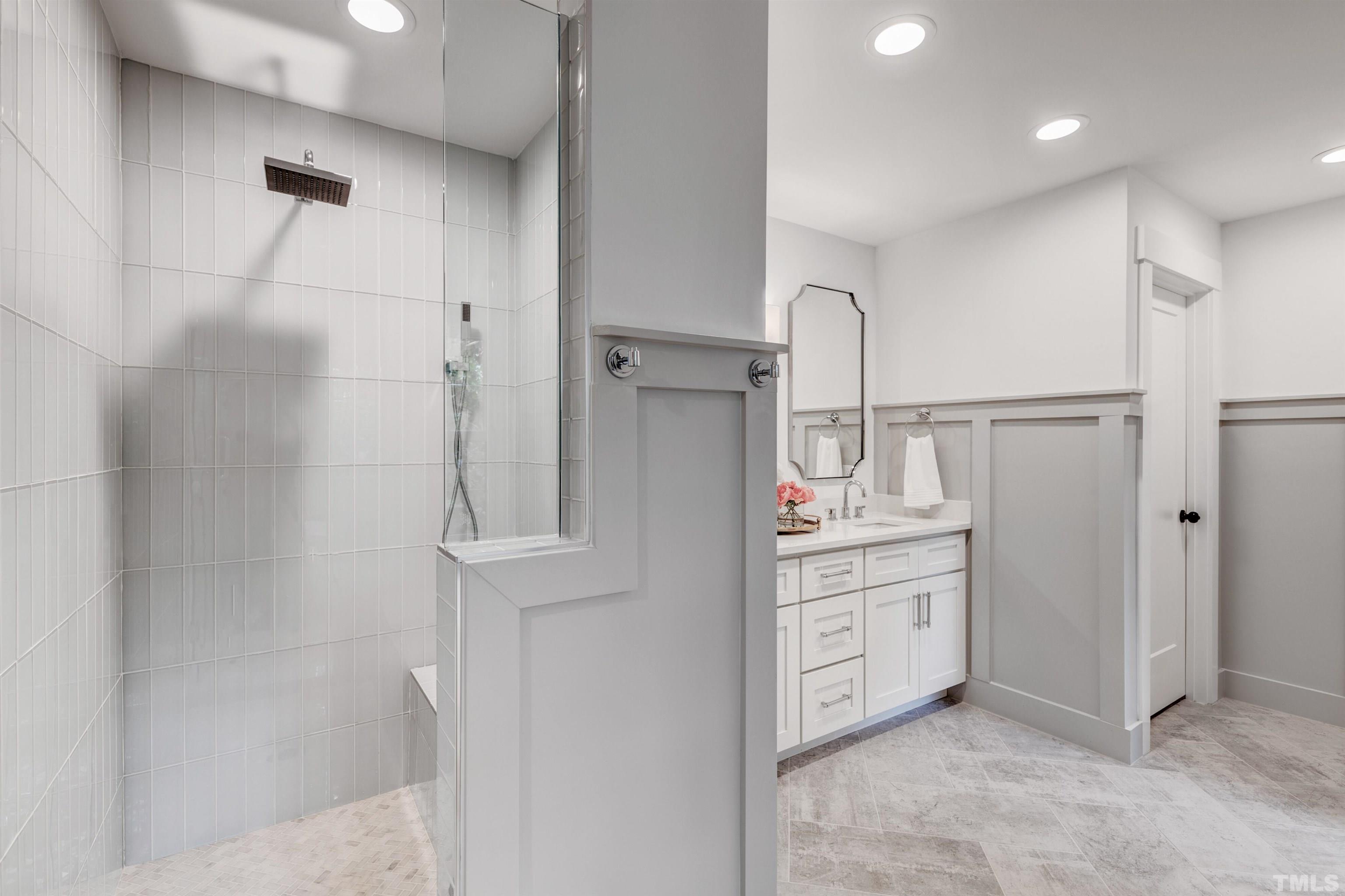 5400 Farley Drive Raleigh, NC 27609 - Photo 27 of 31 a room with a refrigerator and cabinets