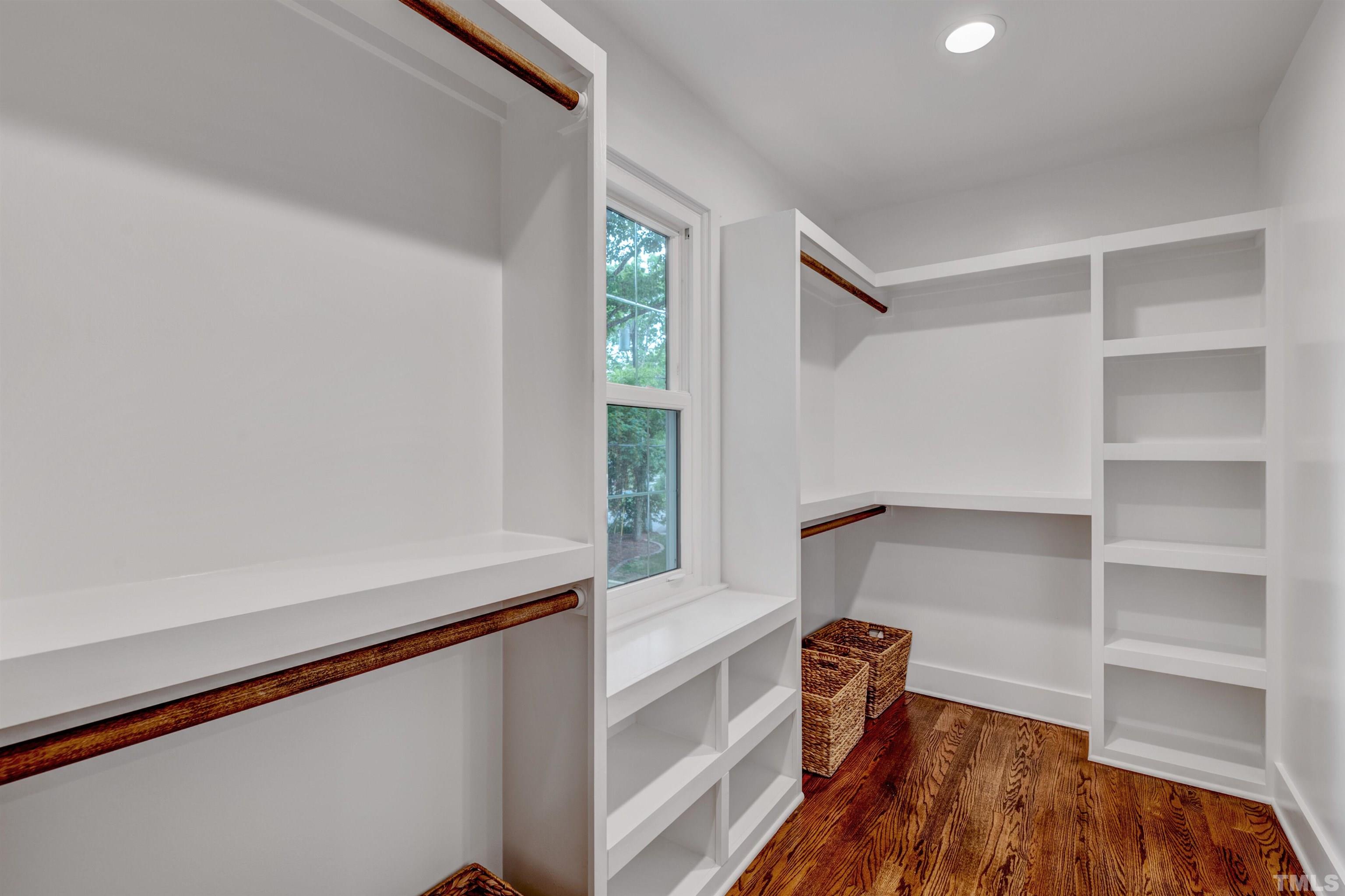 5400 Farley Drive Raleigh, NC 27609 - Photo 28 of 31 a view of walk in closet with empty racks
