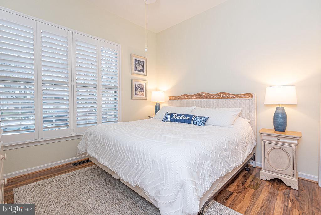 89 October Glory Avenue Ocean View, DE 19970 - Photo 53 of 77 a bedroom with a bed and a window